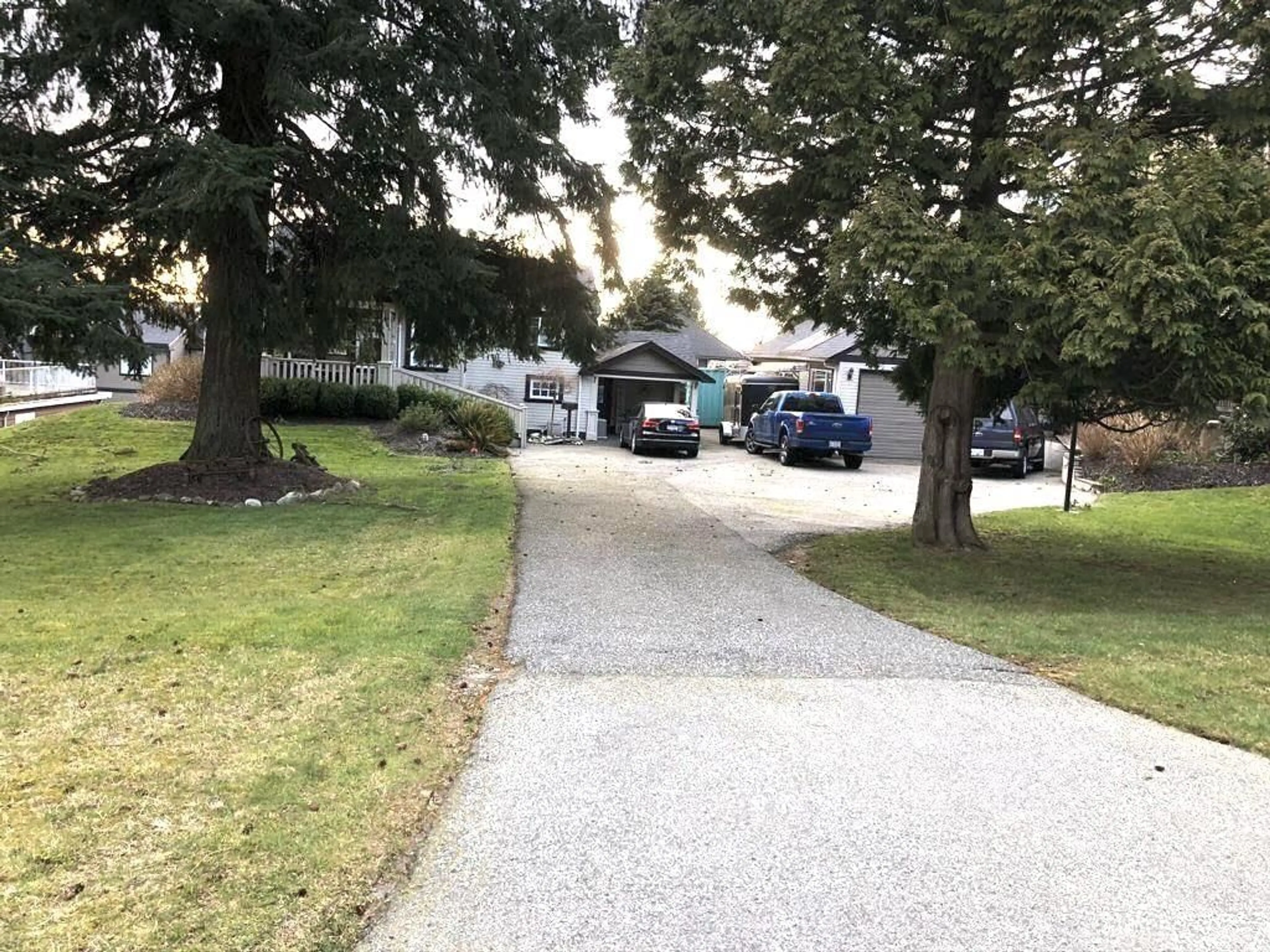 A pic from outside/outdoor area/front of a property/back of a property/a pic from drone, street for 5715 182, Surrey British Columbia V3S4M5