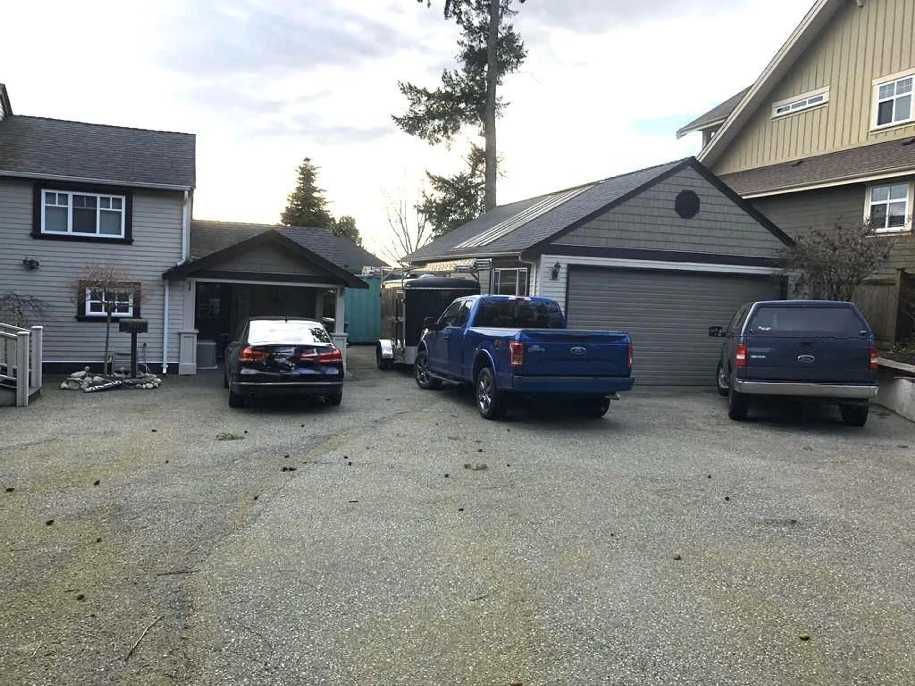 A pic from outside/outdoor area/front of a property/back of a property/a pic from drone, street for 5715 182, Surrey British Columbia V3S4M5