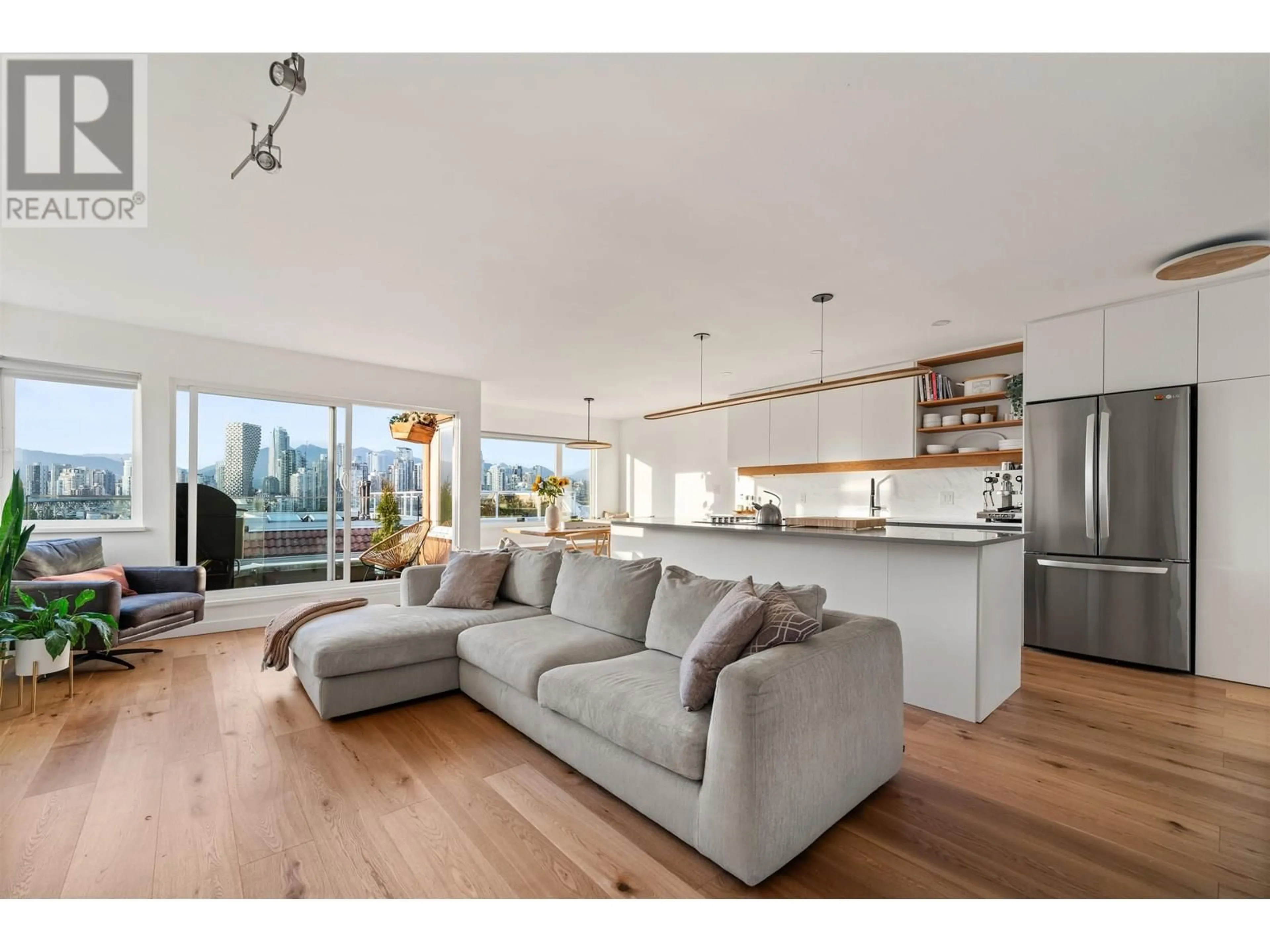 Open concept kitchen, wood/laminate floor for F - 1244 7TH AVENUE, Vancouver British Columbia V6H1B6