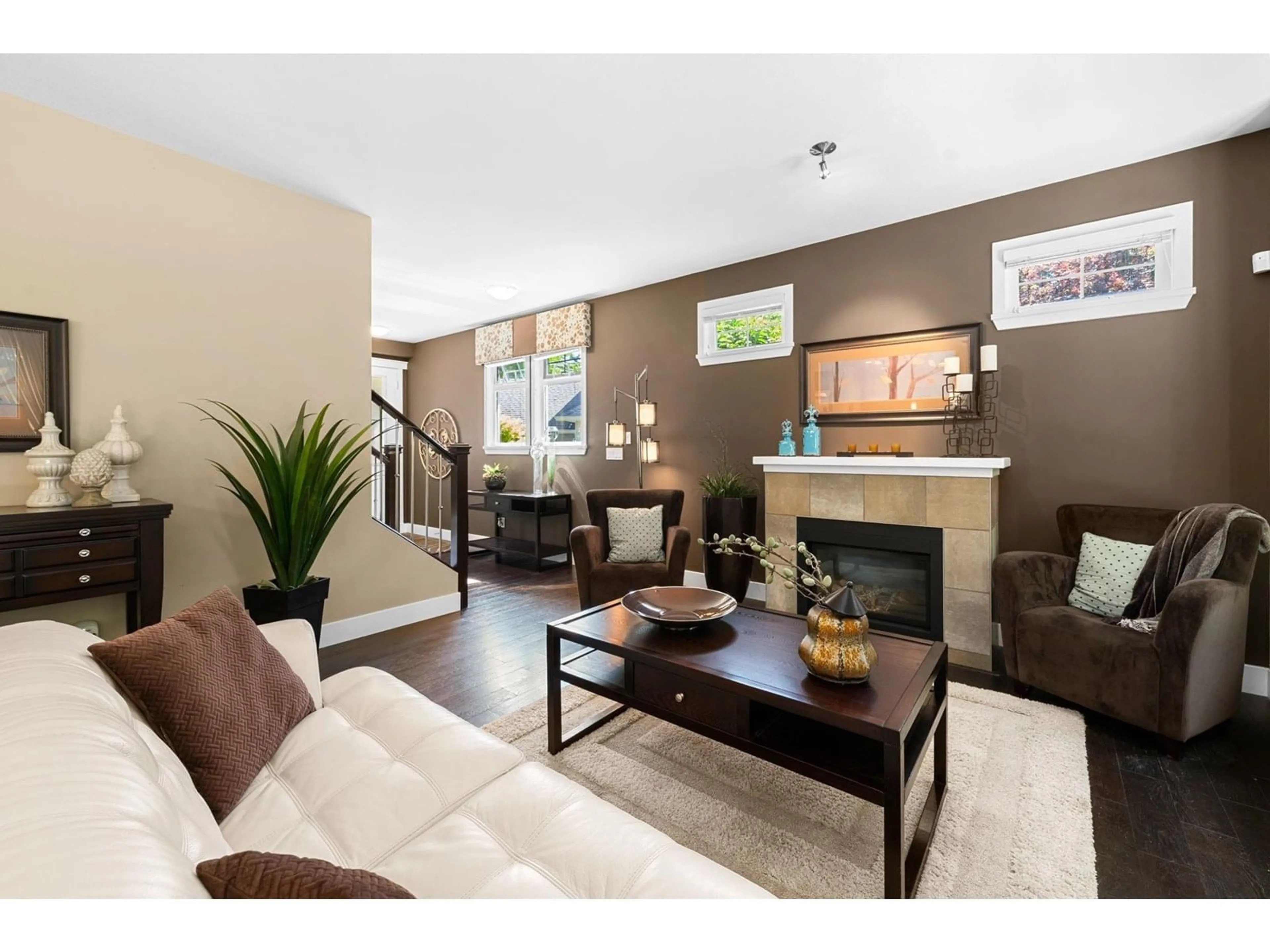 Living room with furniture, wood/laminate floor for 28 - 15454 32, Surrey British Columbia V3Z2J8