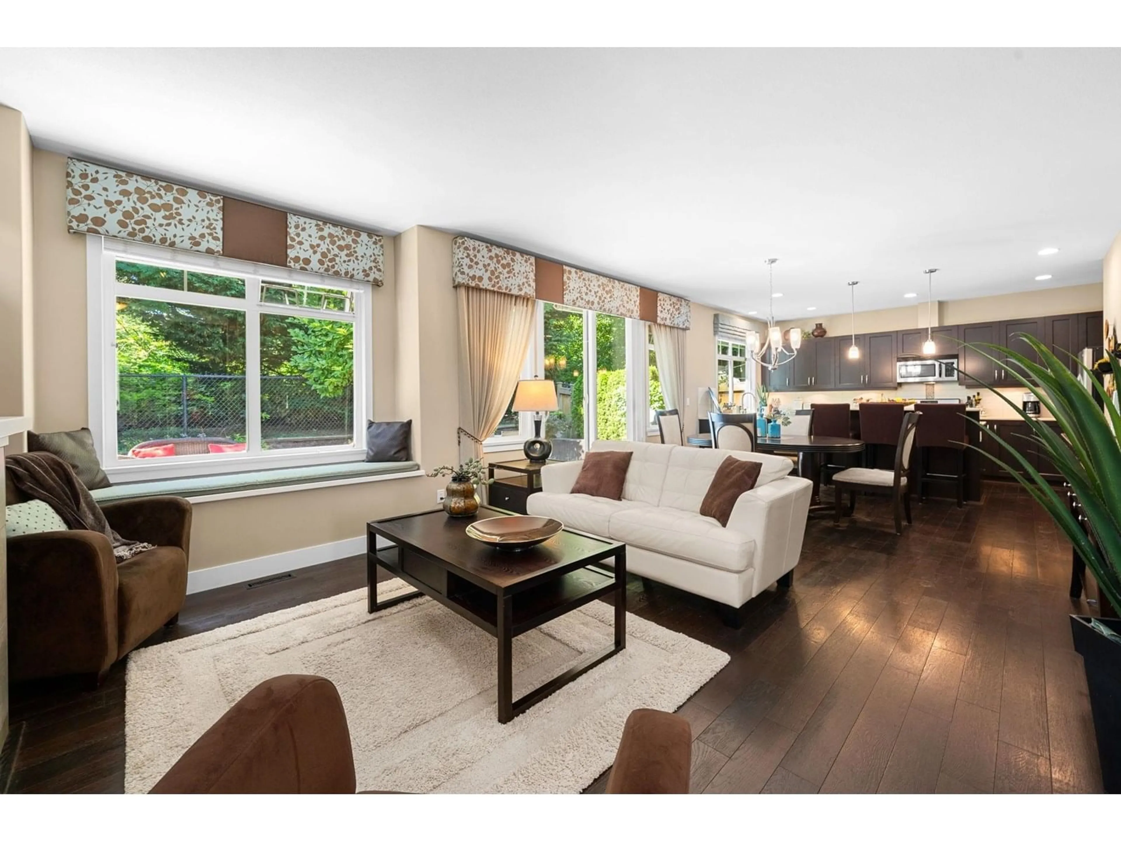Living room with furniture, wood/laminate floor for 28 - 15454 32, Surrey British Columbia V3Z2J8