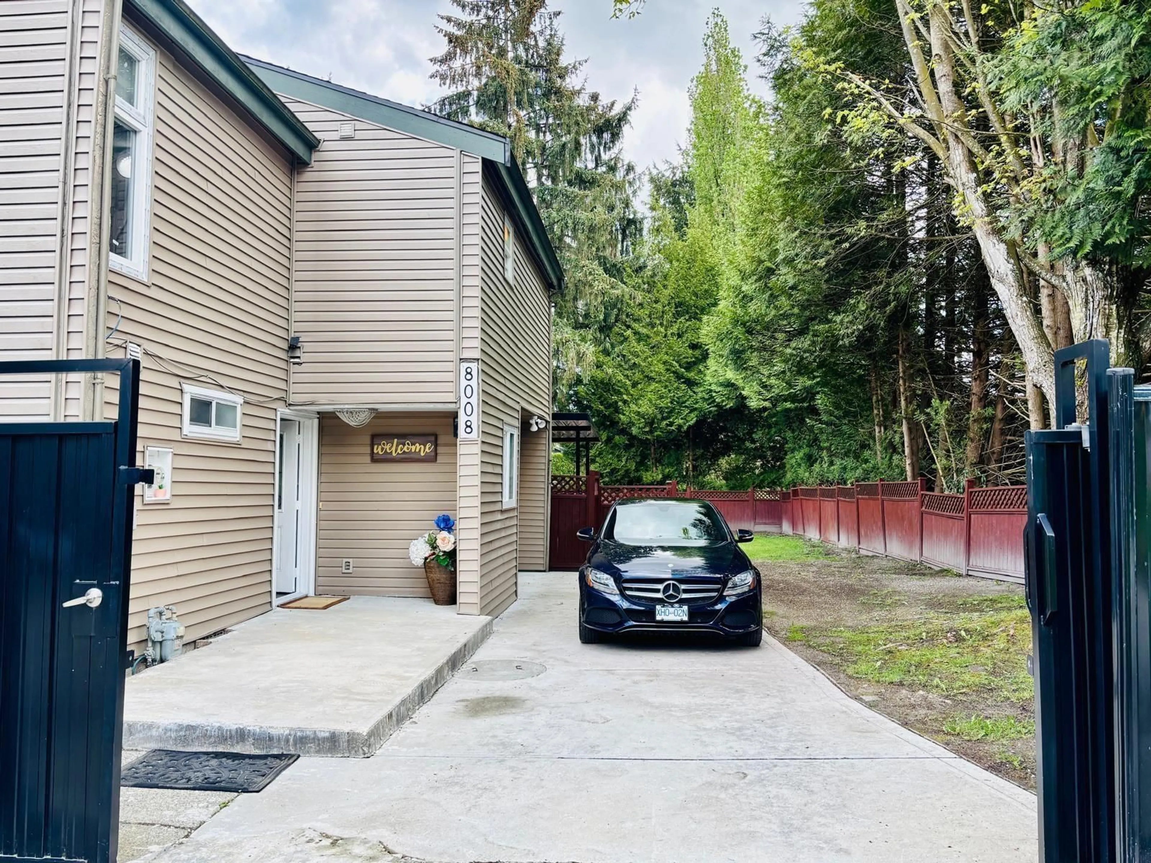 A pic from outside/outdoor area/front of a property/back of a property/a pic from drone, street for 8008 139B, Surrey British Columbia V3W6R3