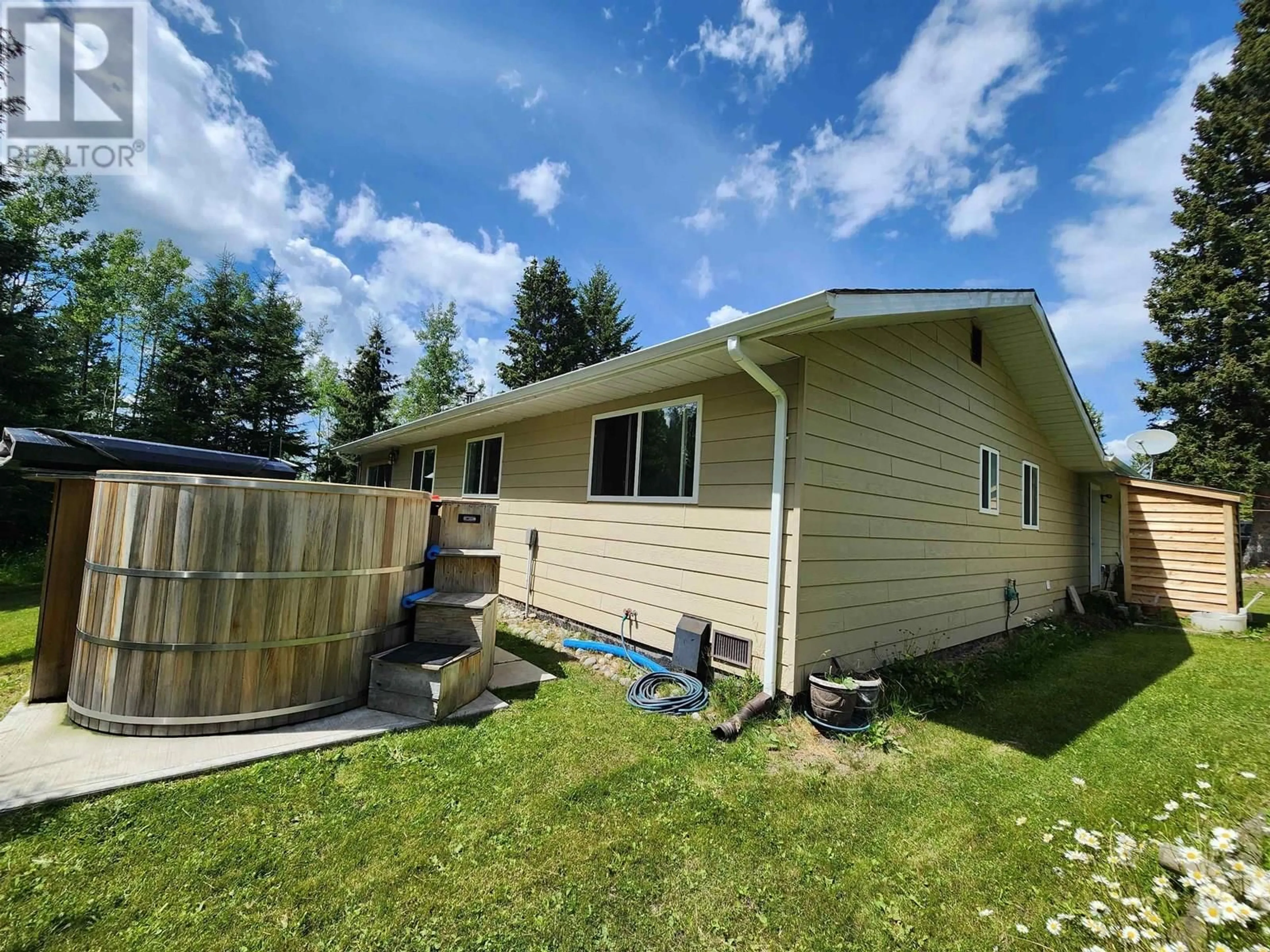 Home with vinyl exterior material, unknown for 7673 GRAHAM ROAD, Bridge Lake British Columbia V0K1E0