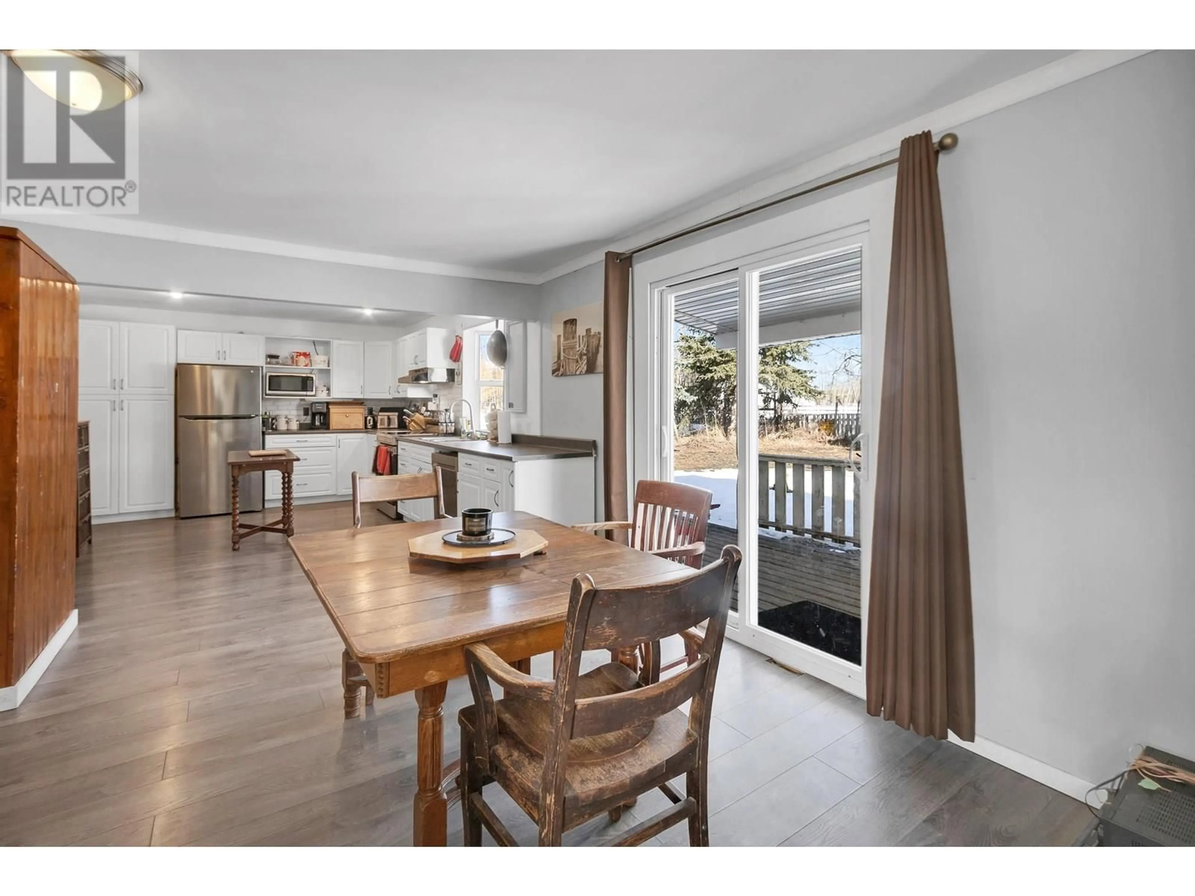 Open concept kitchen, wood/laminate floor for 7545 POOLEY ROAD, Prince George British Columbia V2N5W4
