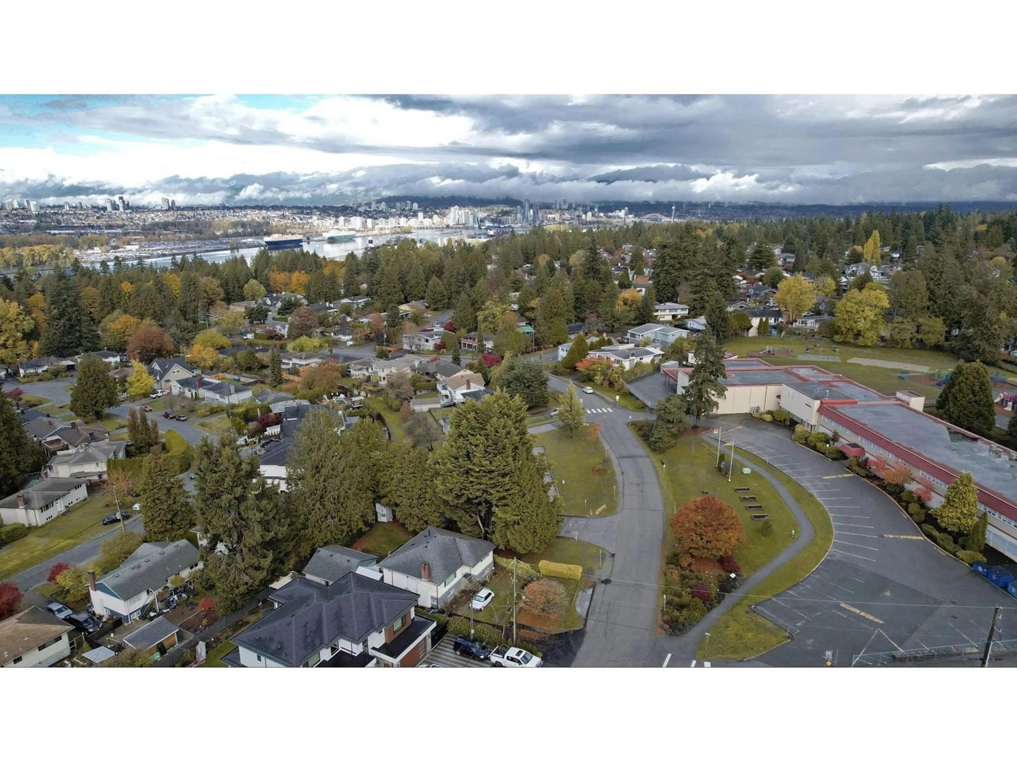 A pic from outside/outdoor area/front of a property/back of a property/a pic from drone, mountain view for 8824 RUSSELL, Delta British Columbia V4C4P7