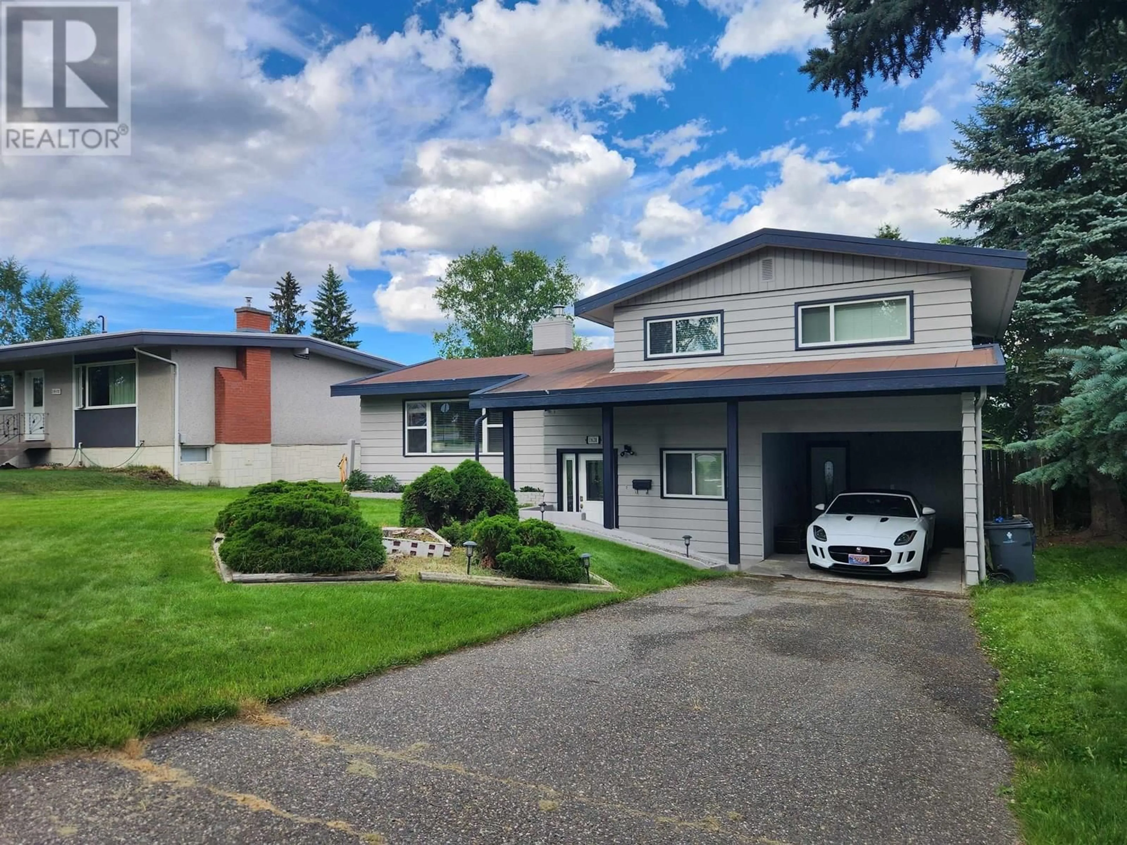 Home with vinyl exterior material, street for 1628 GILLETT STREET, Prince George British Columbia V2M2V4