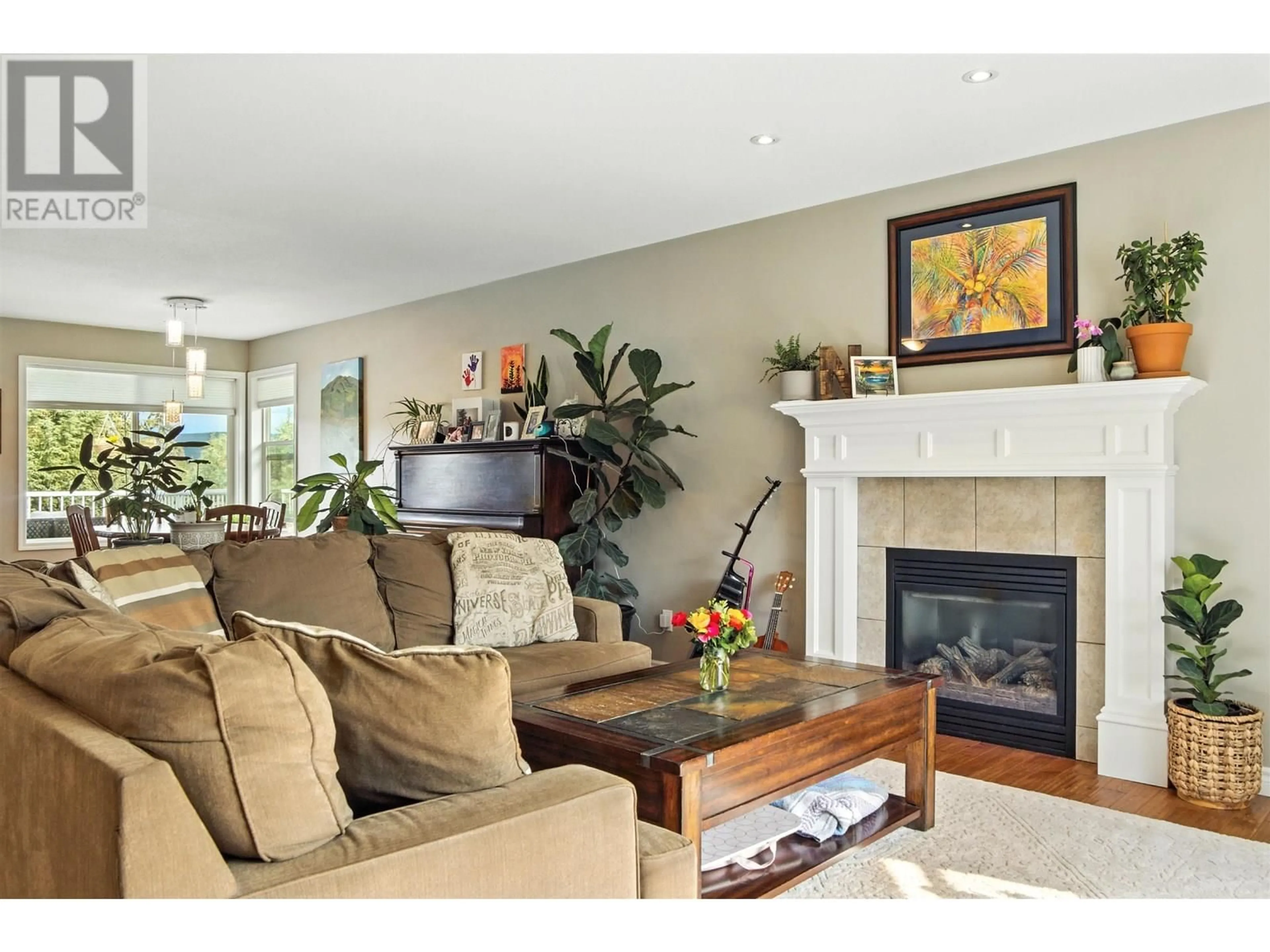 Living room with furniture, wood/laminate floor for 40 WESTRIDGE DRIVE, Williams Lake British Columbia V2G5K3