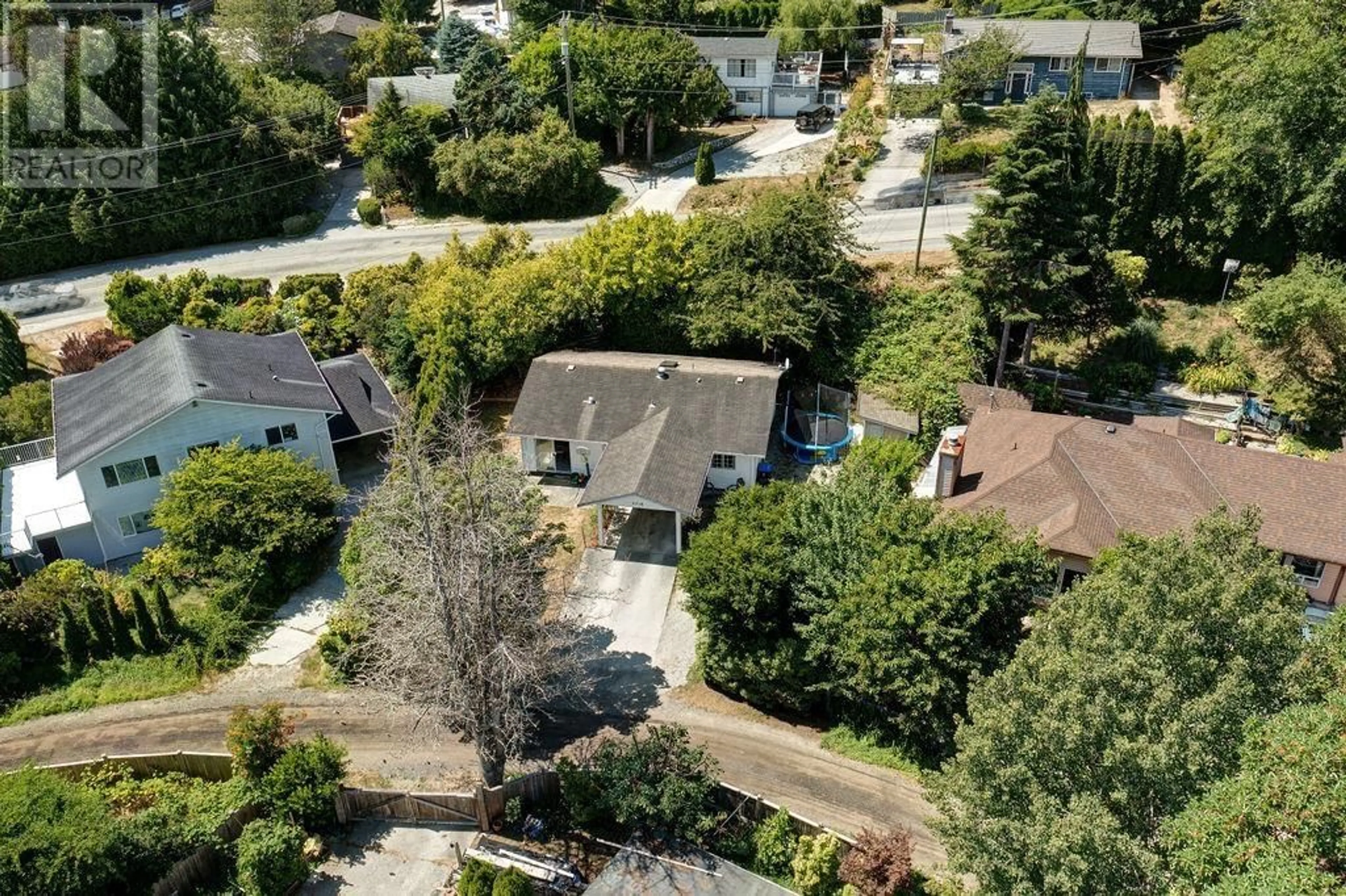A pic from outside/outdoor area/front of a property/back of a property/a pic from drone, street for 5718 TRAIL AVENUE, Sechelt British Columbia V0N3A6