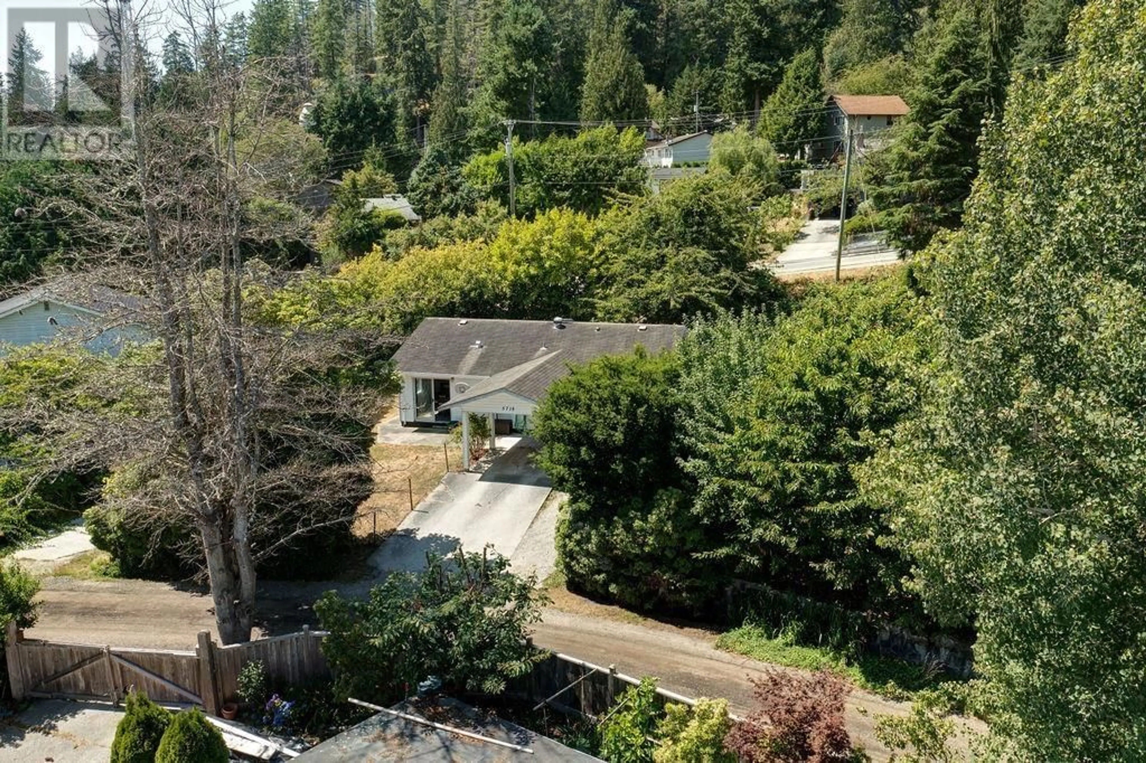 A pic from outside/outdoor area/front of a property/back of a property/a pic from drone, unknown for 5718 TRAIL AVENUE, Sechelt British Columbia V0N3A6