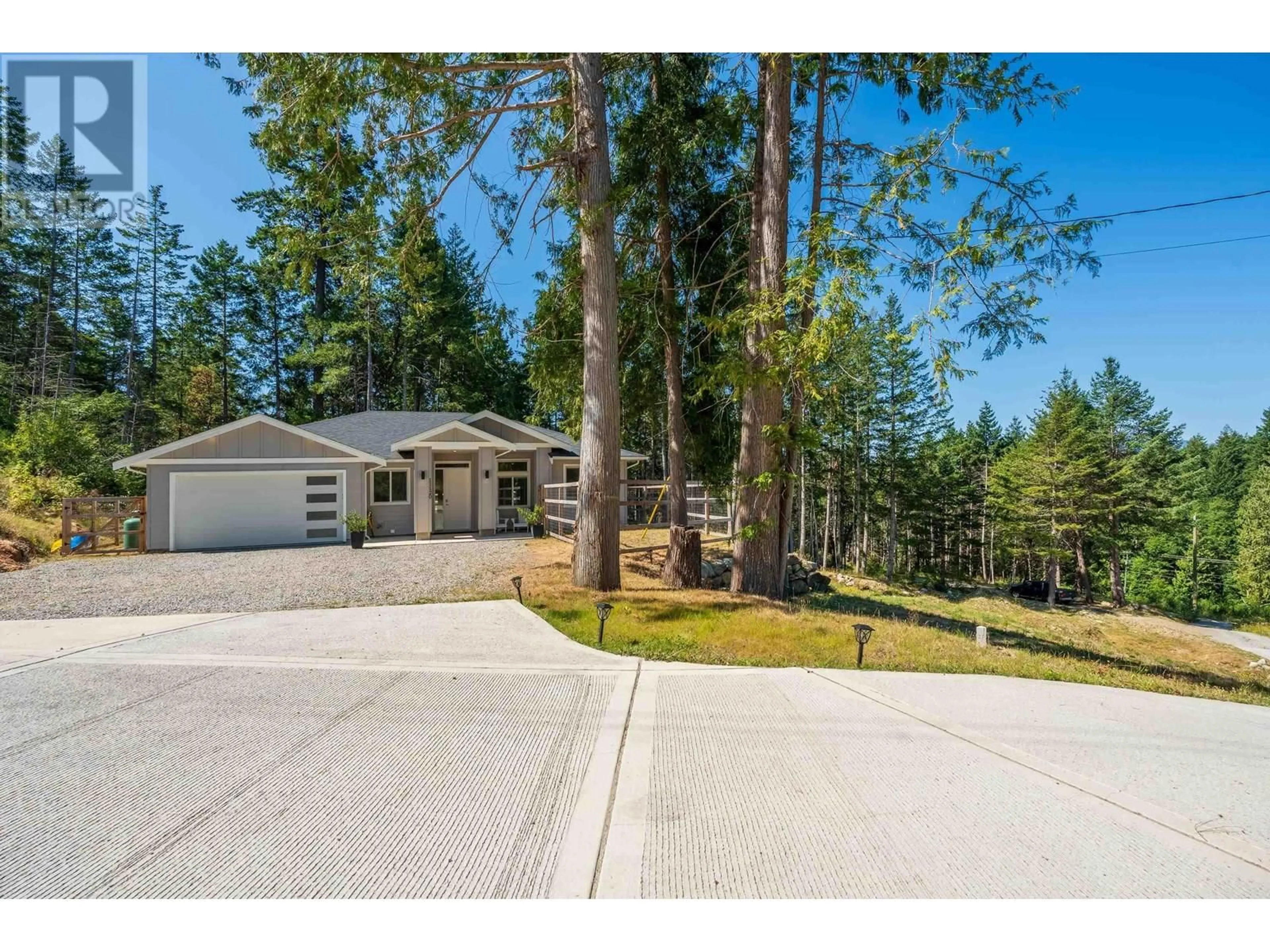 A pic from outside/outdoor area/front of a property/back of a property/a pic from drone, street for 11120 SUNSHINE COAST HIGHWAY, Pender Harbour British Columbia V7Z1B9