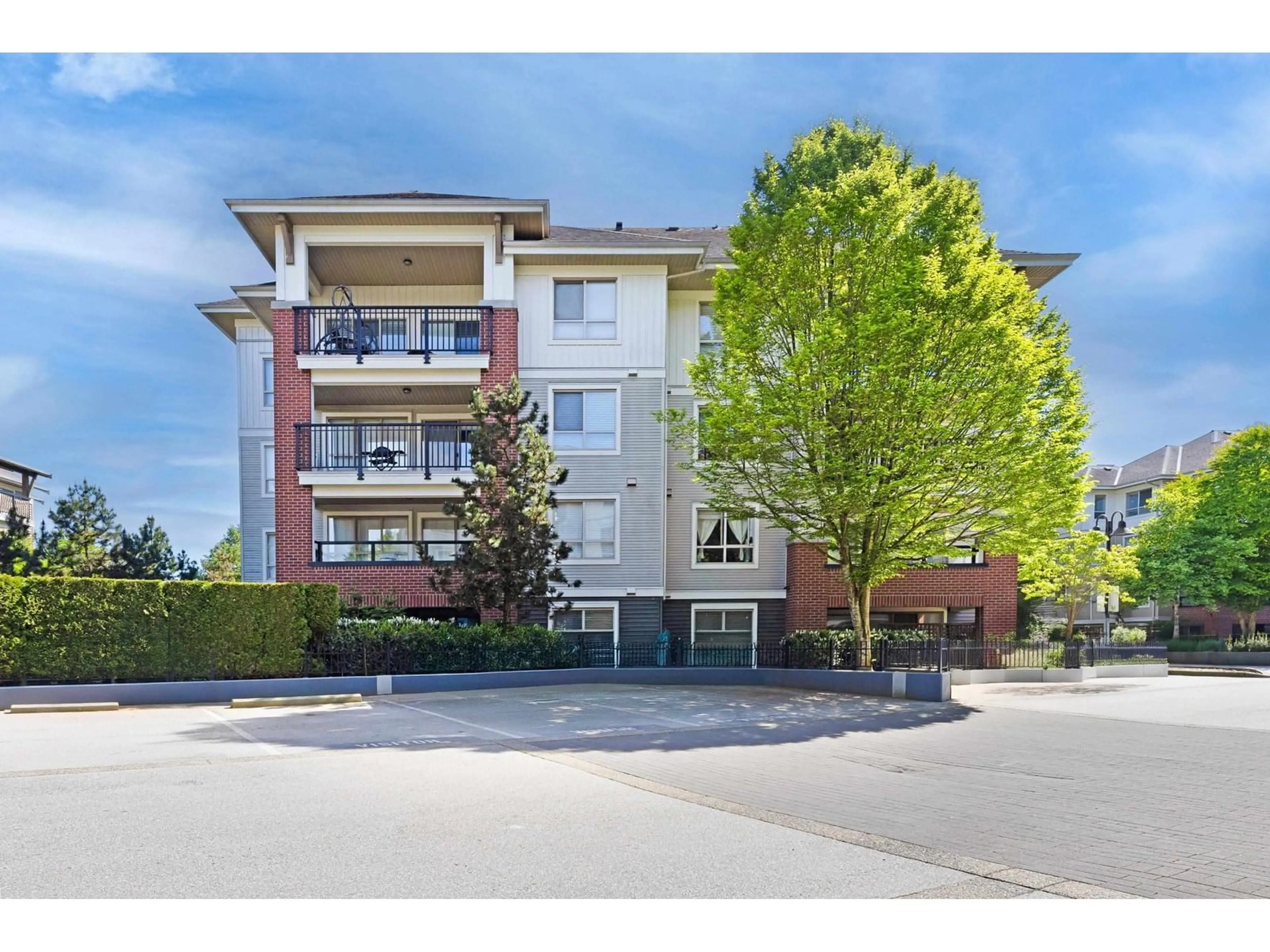 A pic from outside/outdoor area/front of a property/back of a property/a pic from drone, unknown for A205 - 8929 202, Langley British Columbia V1M0B4