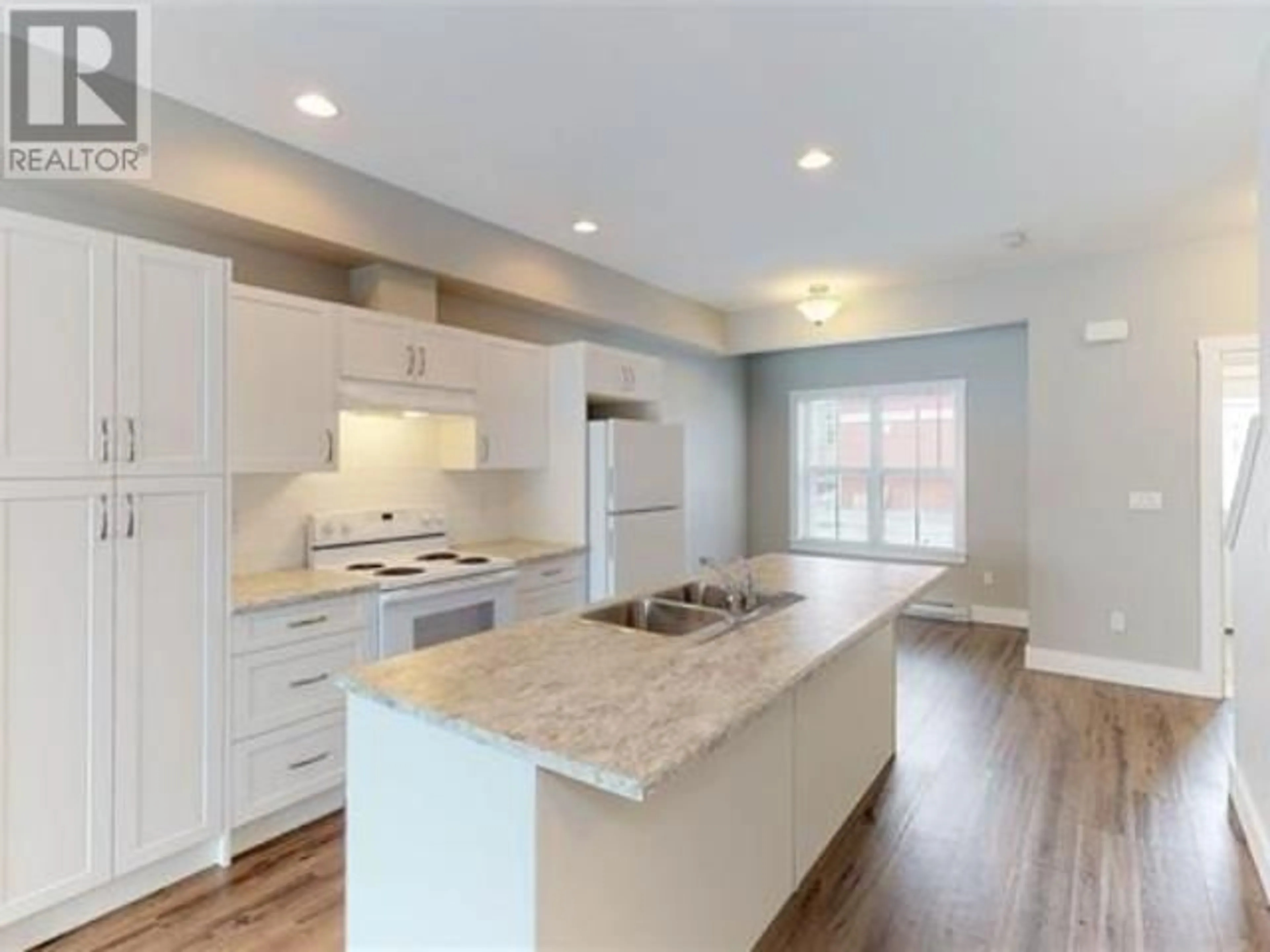 Open concept kitchen, unknown for 118 - 11008 102 AVENUE, Fort St. John British Columbia V1J2G2