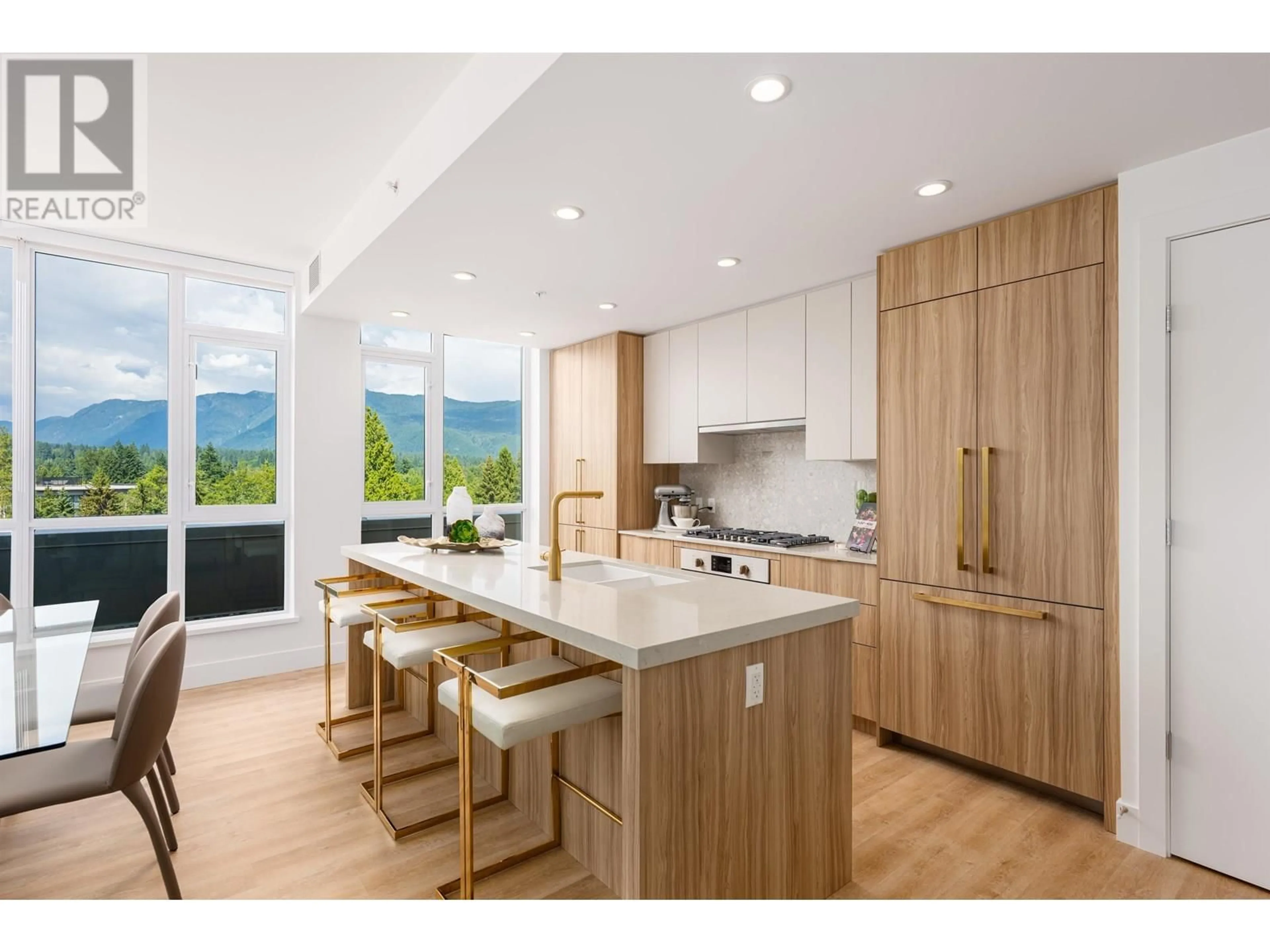 Open concept kitchen, wood/laminate floor for 703 - 2385 EMERY COURT, North Vancouver British Columbia V7J0G1