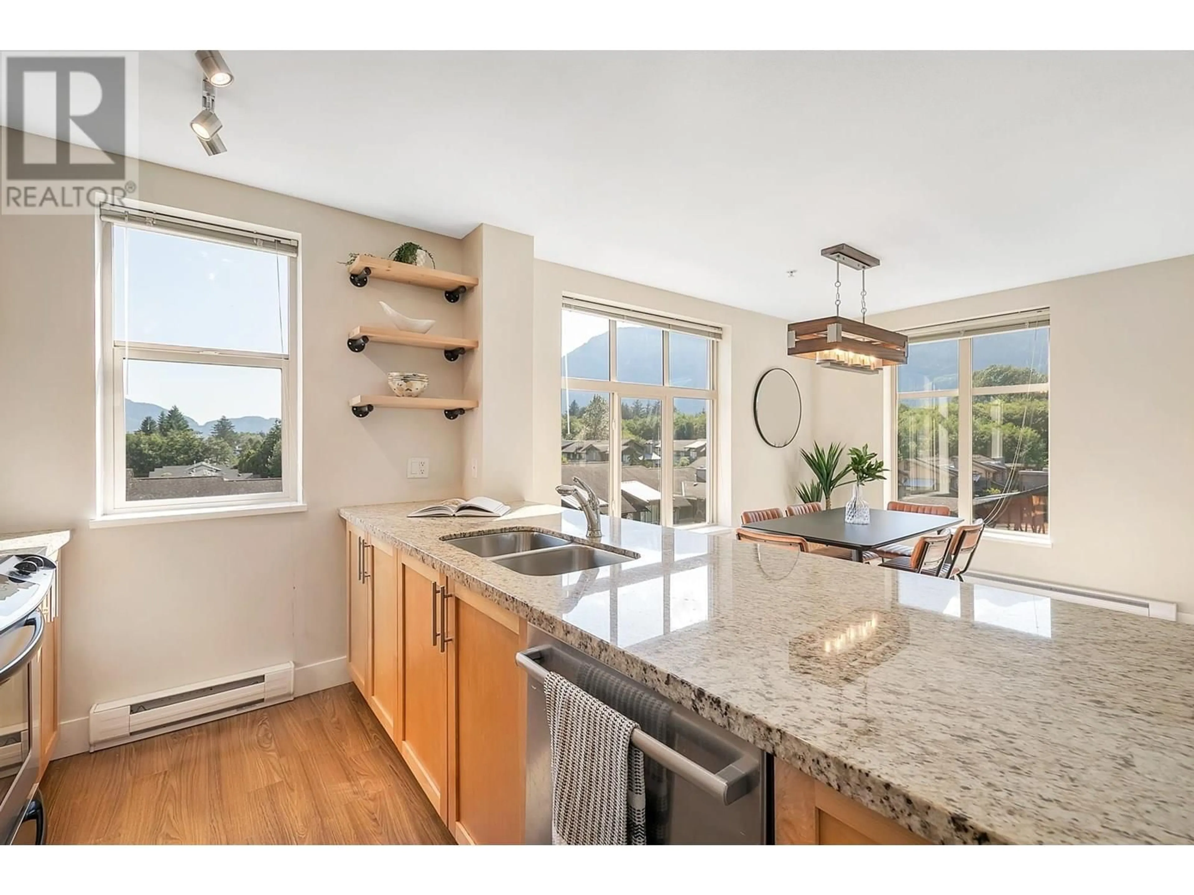 Open concept kitchen, unknown for 401 - 1211 VILLAGE GREEN WAY, Squamish British Columbia V8B0R7