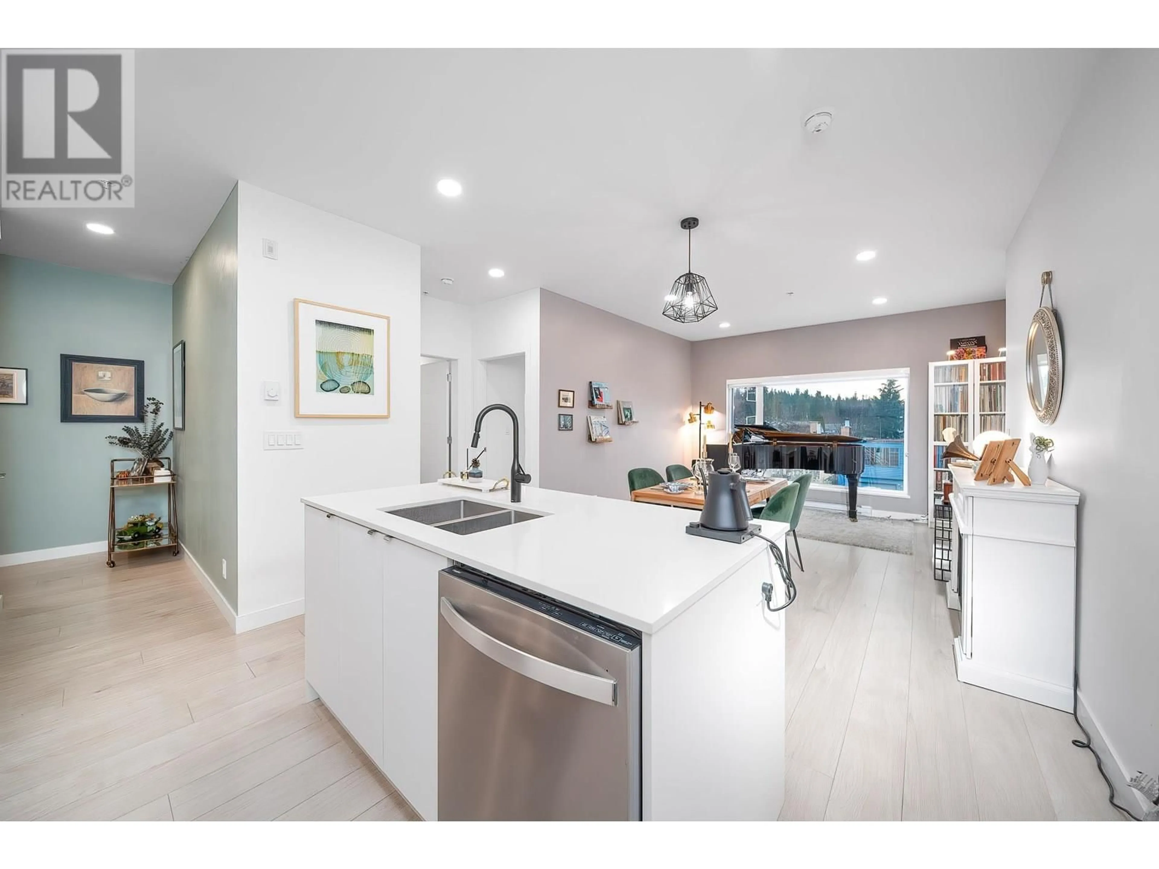 Open concept kitchen, ceramic/tile floor for 217 - 2345 RINDALL AVENUE, Port Coquitlam British Columbia V3C0T1