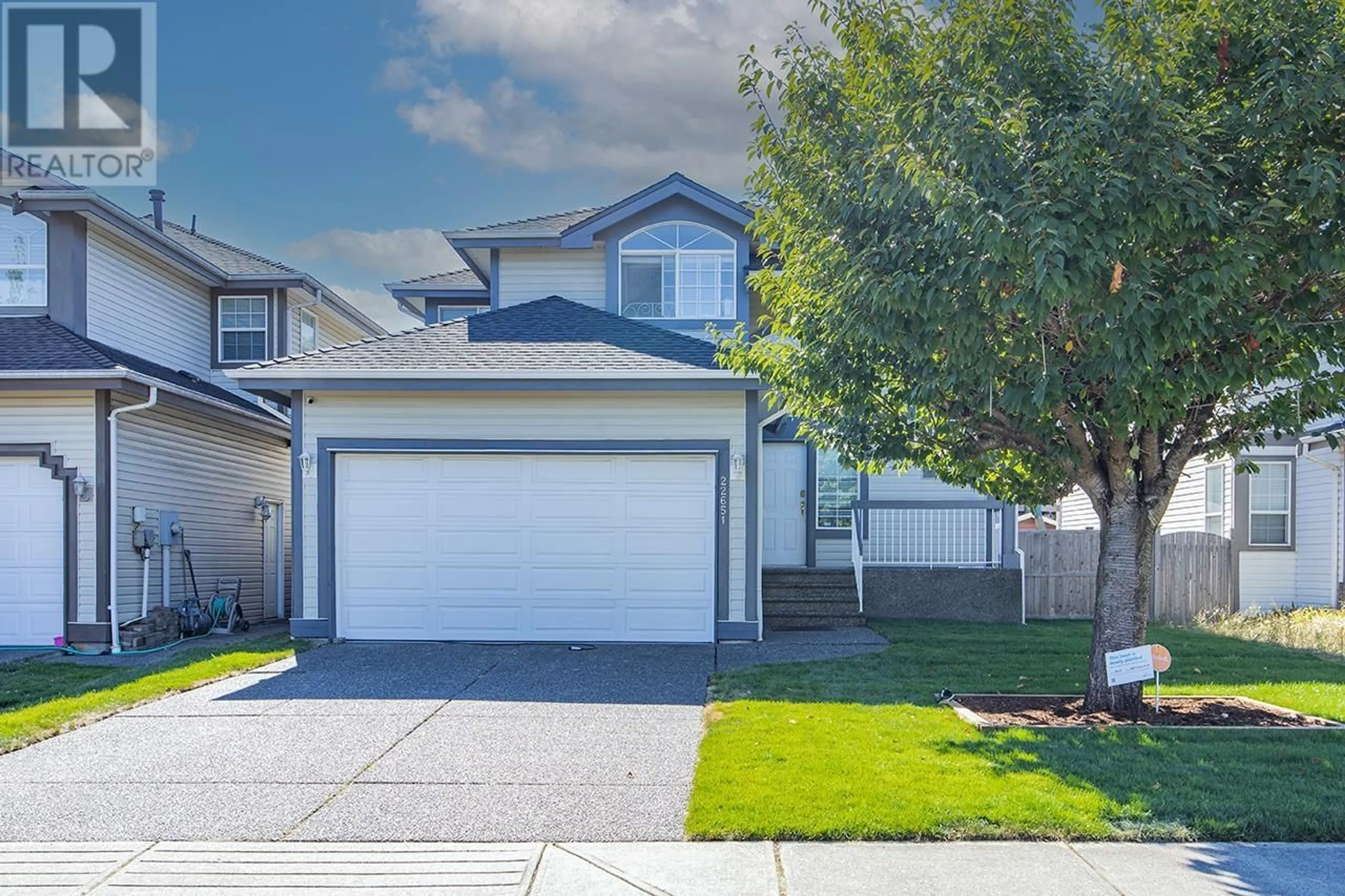 Home with vinyl exterior material, street for 22651 CHALDECOTT DRIVE, Richmond British Columbia V6V2T9