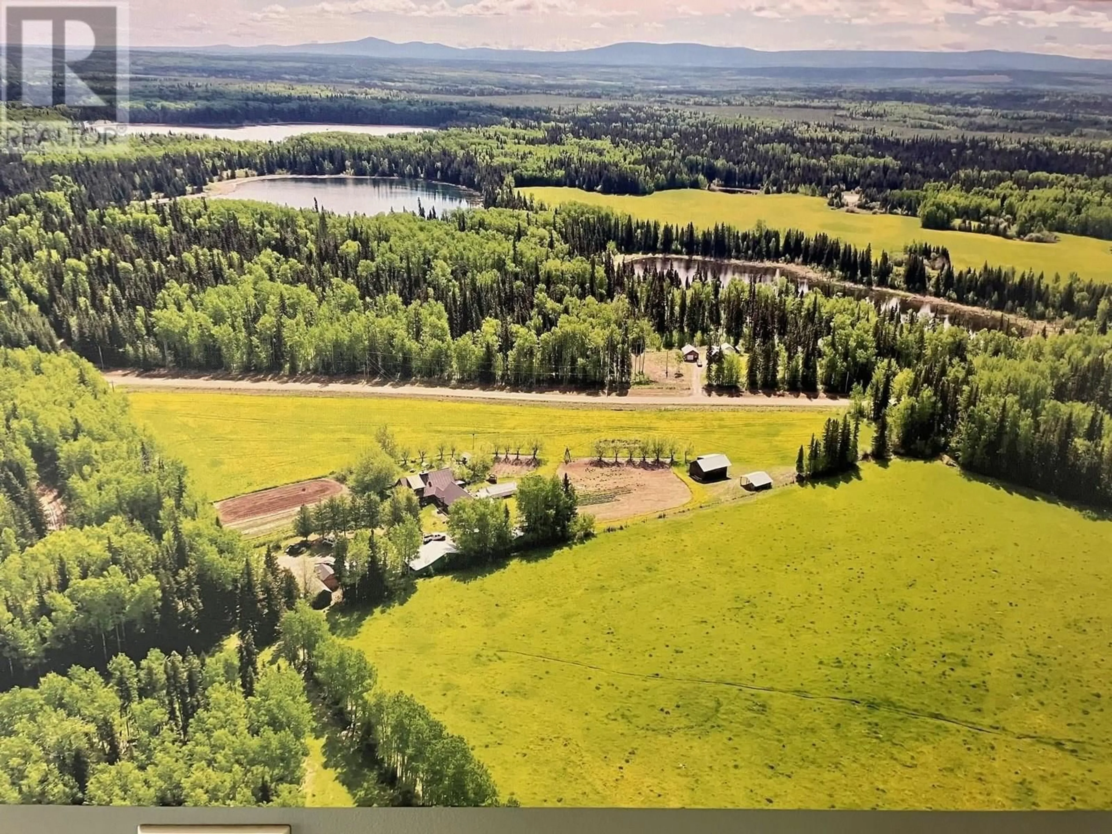 A pic from outside/outdoor area/front of a property/back of a property/a pic from drone, water/lake/river/ocean view for 16239 LILY LAKE ROAD, Fraser Lake British Columbia V0J1S0