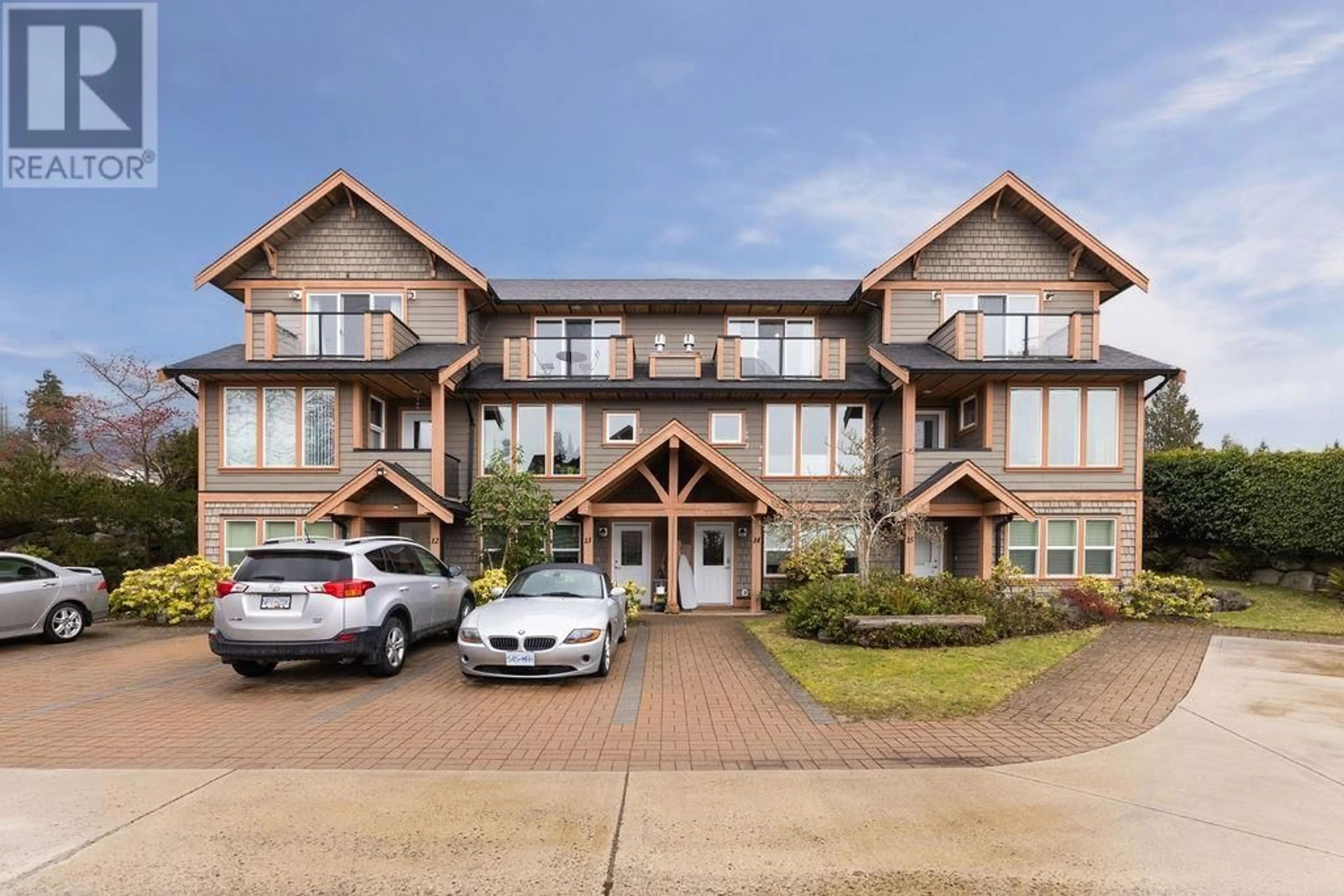 A pic from outside/outdoor area/front of a property/back of a property/a pic from drone, building for 14 - 728 GIBSONS WAY, Gibsons British Columbia V0N1V9