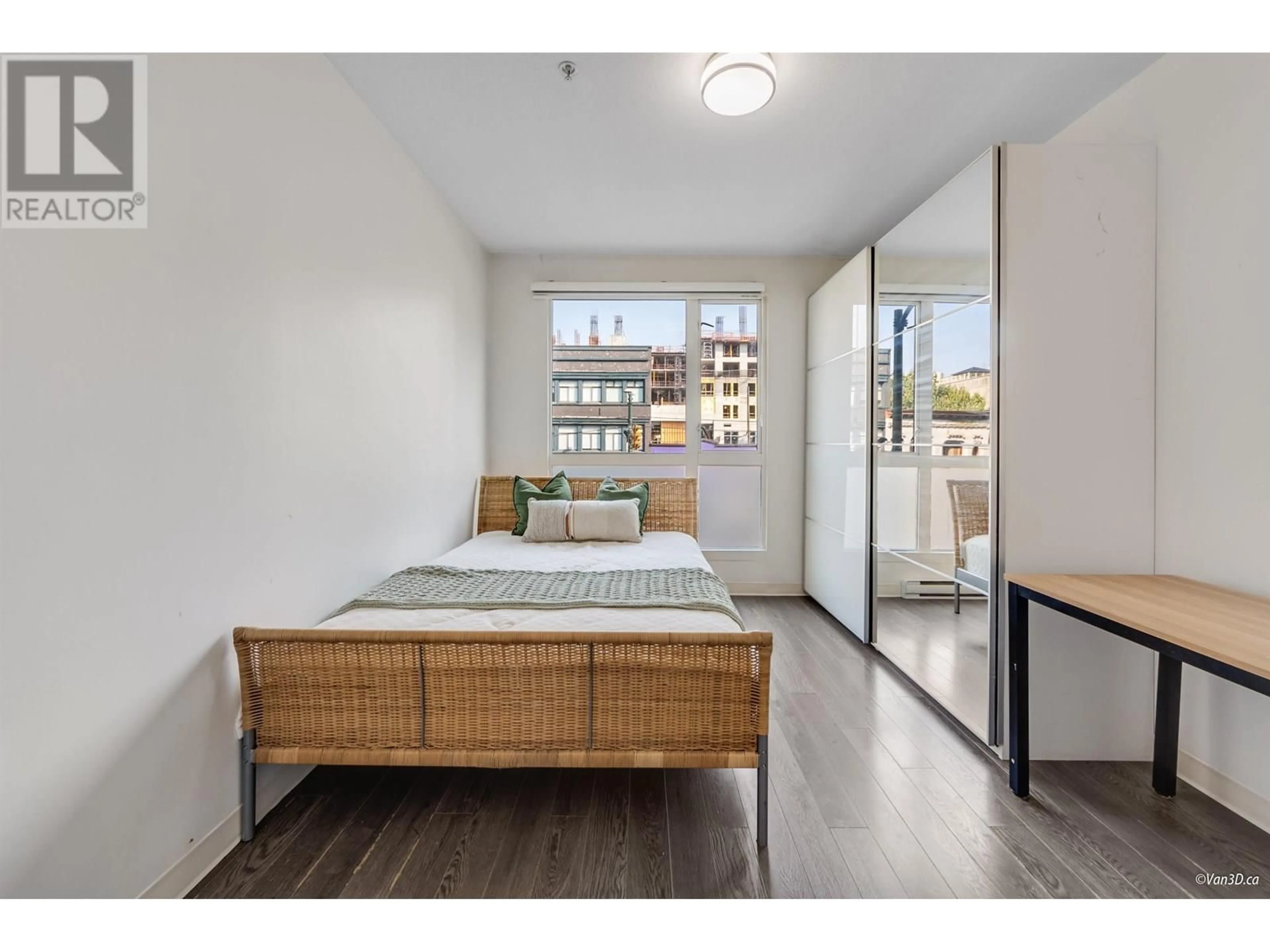 Bedroom with bed, wood/laminate floor for 206 - 138 HASTINGS STREET, Vancouver British Columbia V6A1N4