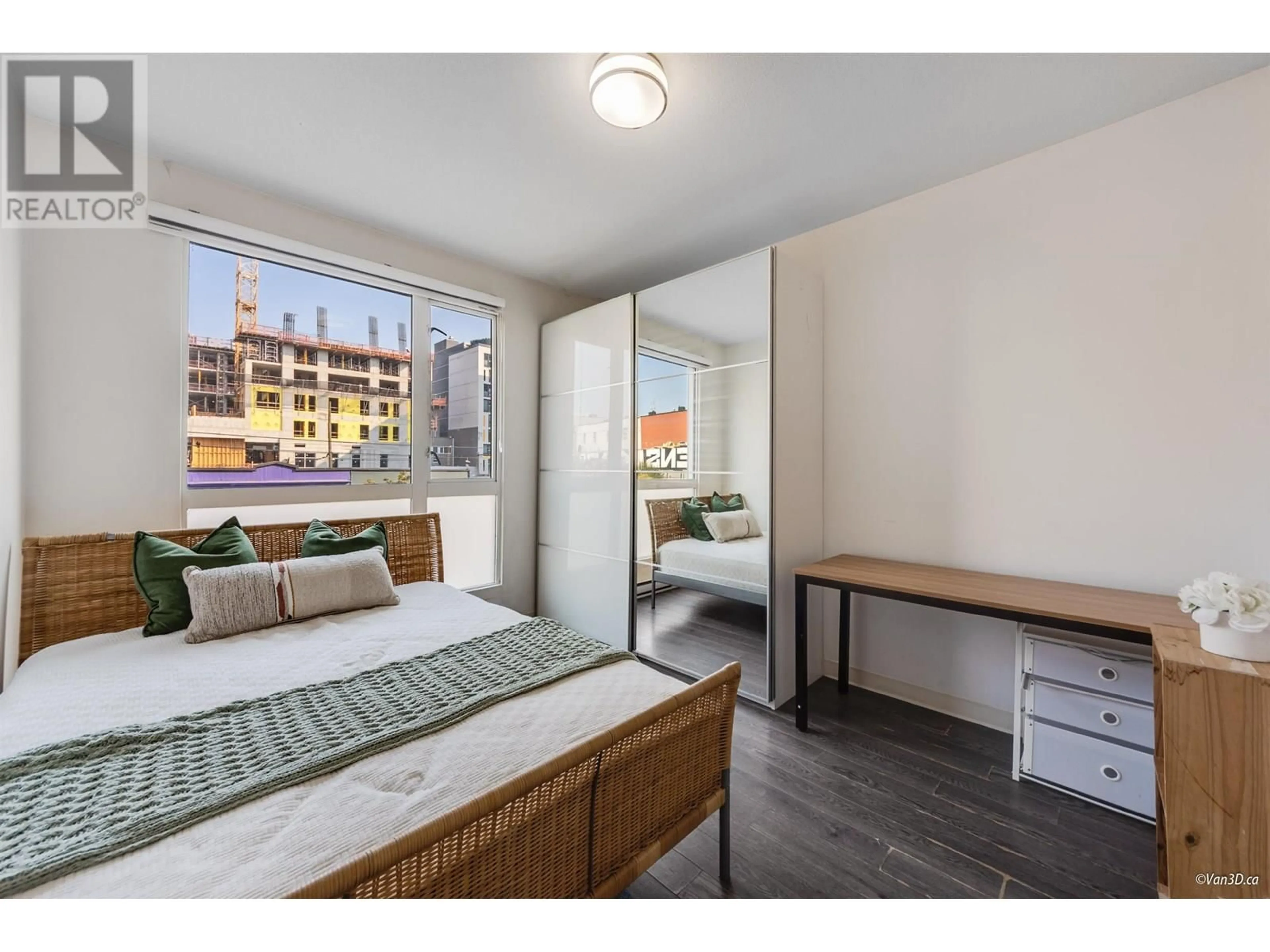 Bedroom with bed, wood/laminate floor for 206 - 138 HASTINGS STREET, Vancouver British Columbia V6A1N4