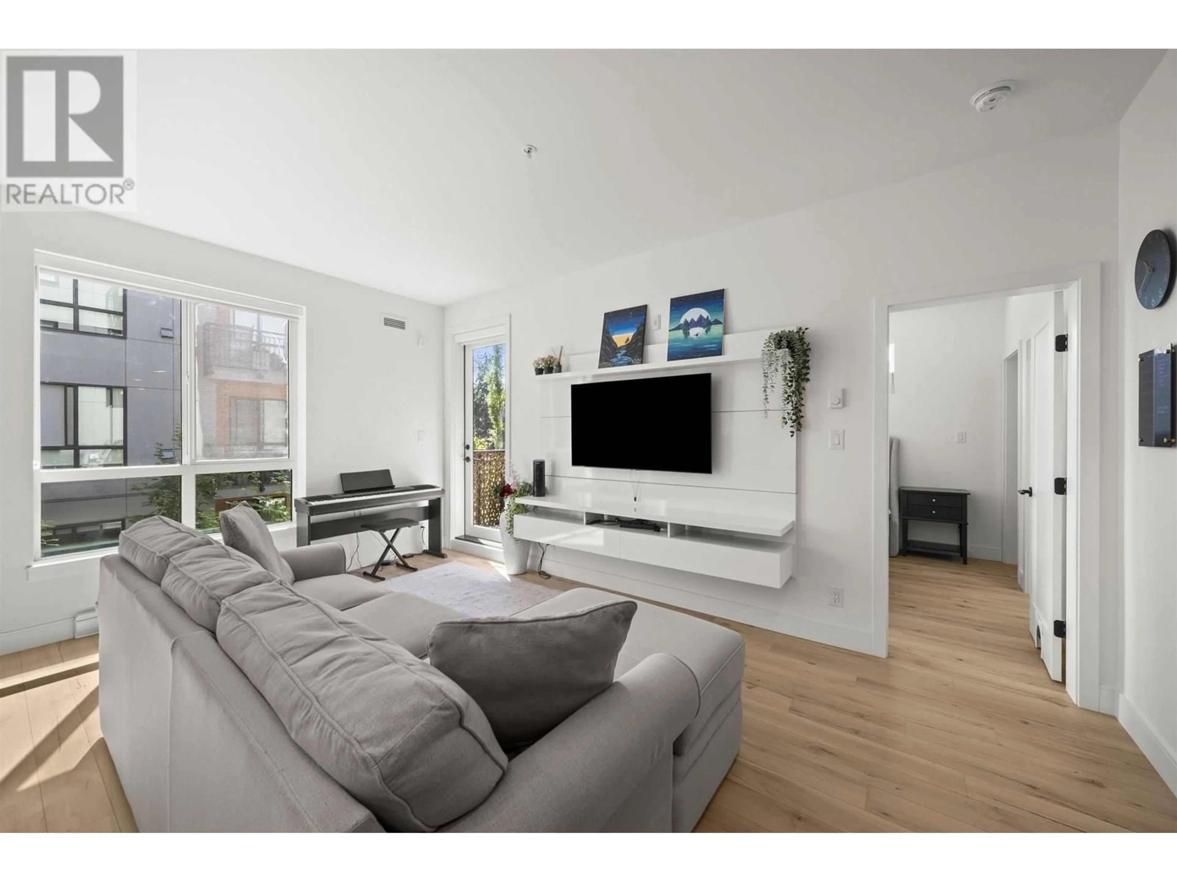 Living room with furniture, unknown for 309 - 3131 MURRAY STREET, Port Moody British Columbia V3H0L9