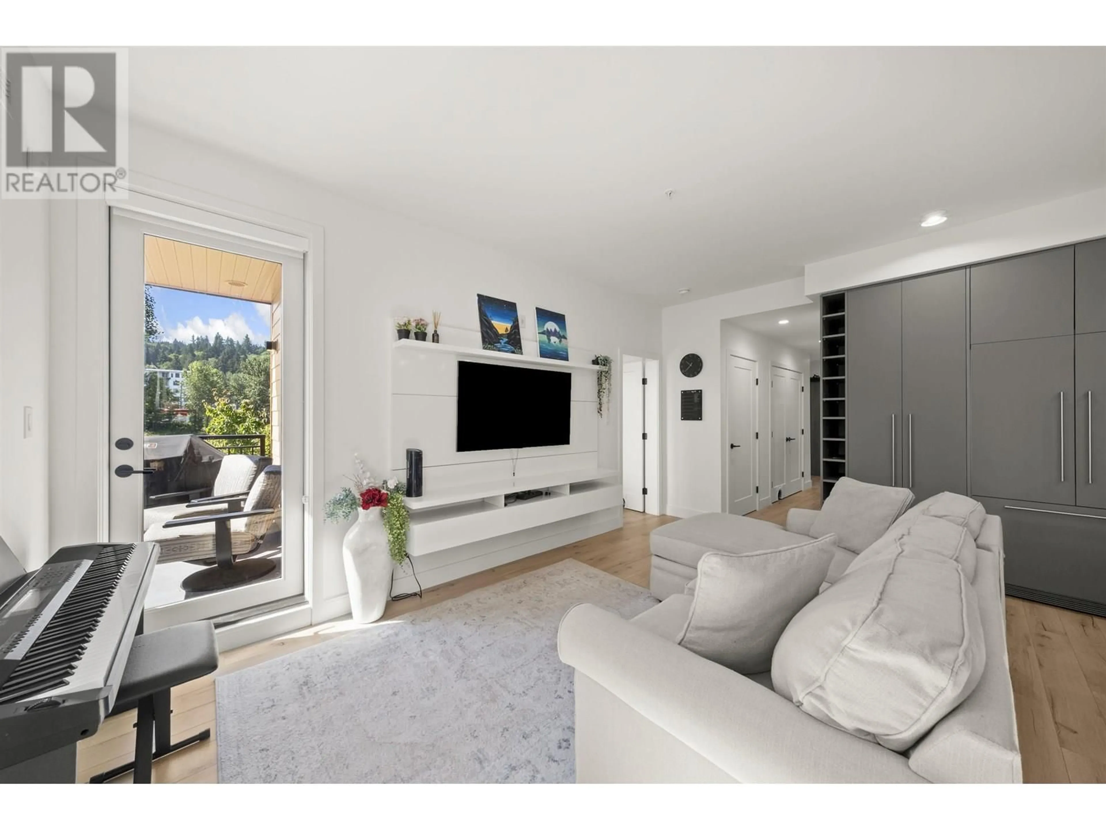 Living room with furniture, unknown for 309 - 3131 MURRAY STREET, Port Moody British Columbia V3H0L9