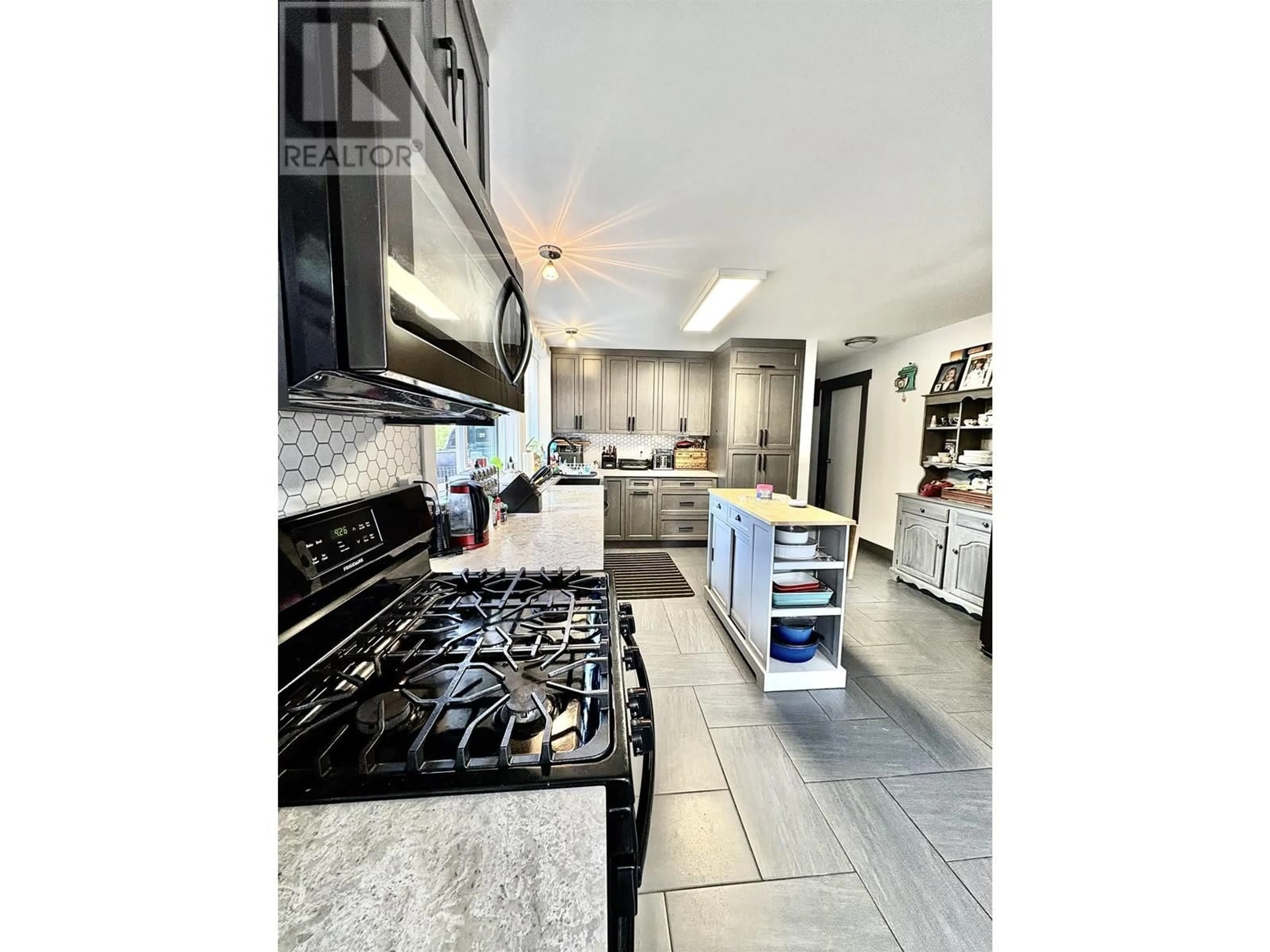 Contemporary kitchen, ceramic/tile floor for 67 SAGUENAY STREET, Kitimat British Columbia V8C1W7