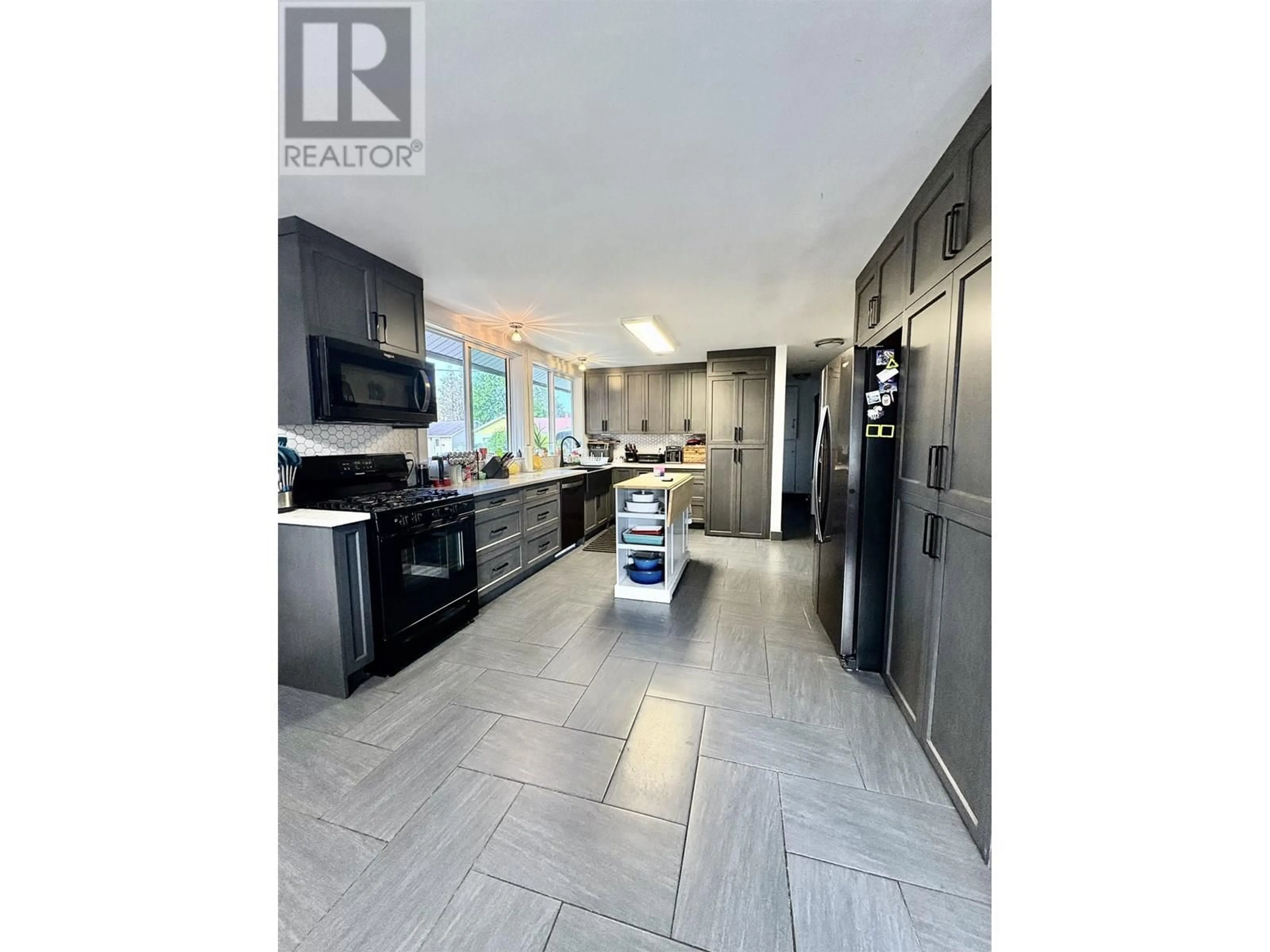 Open concept kitchen, ceramic/tile floor for 67 SAGUENAY STREET, Kitimat British Columbia V8C1W7