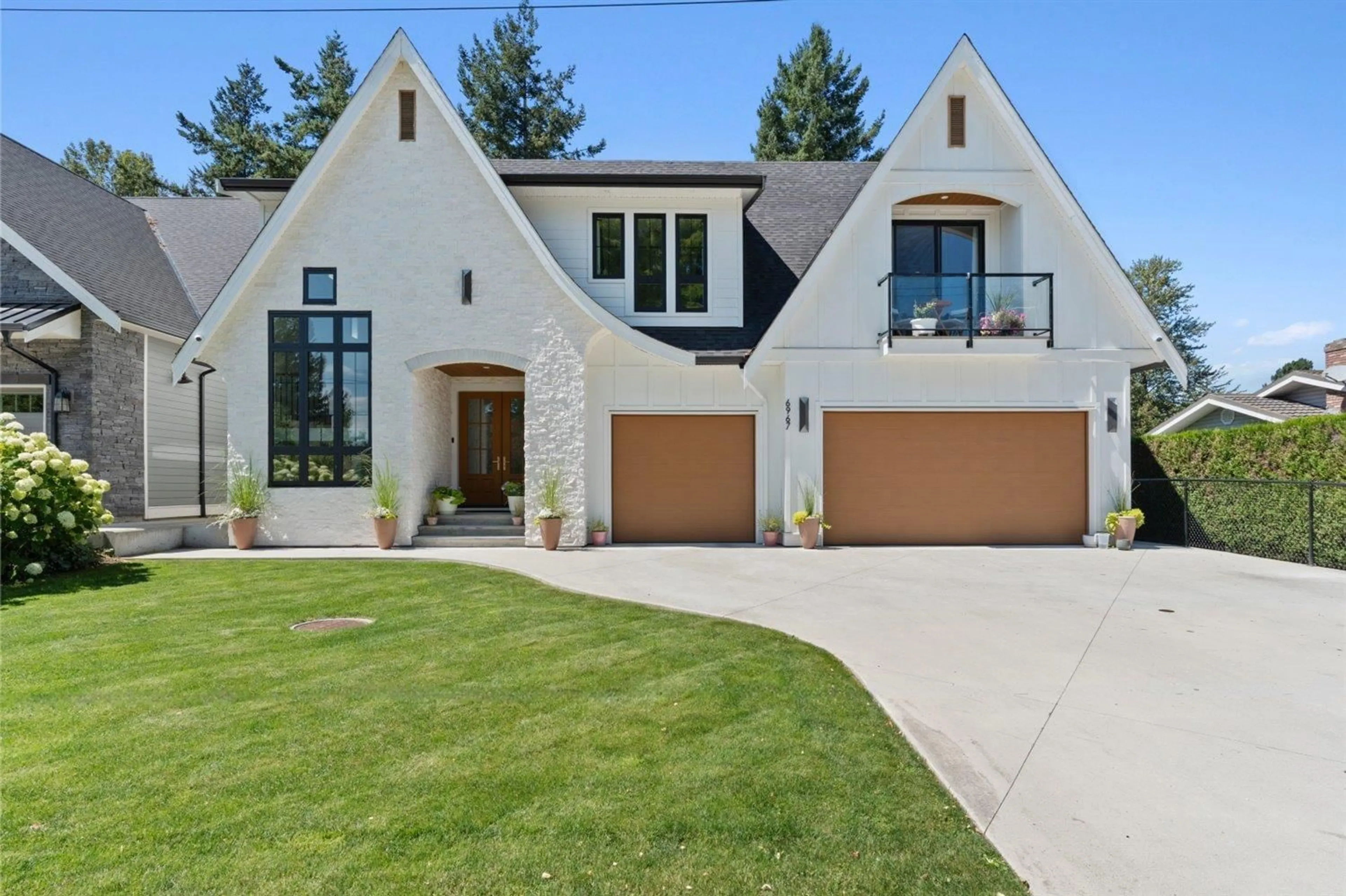 Home with brick exterior material, street for 6967 CENTENNIAL DRIVE, Chilliwack British Columbia V2R1J7