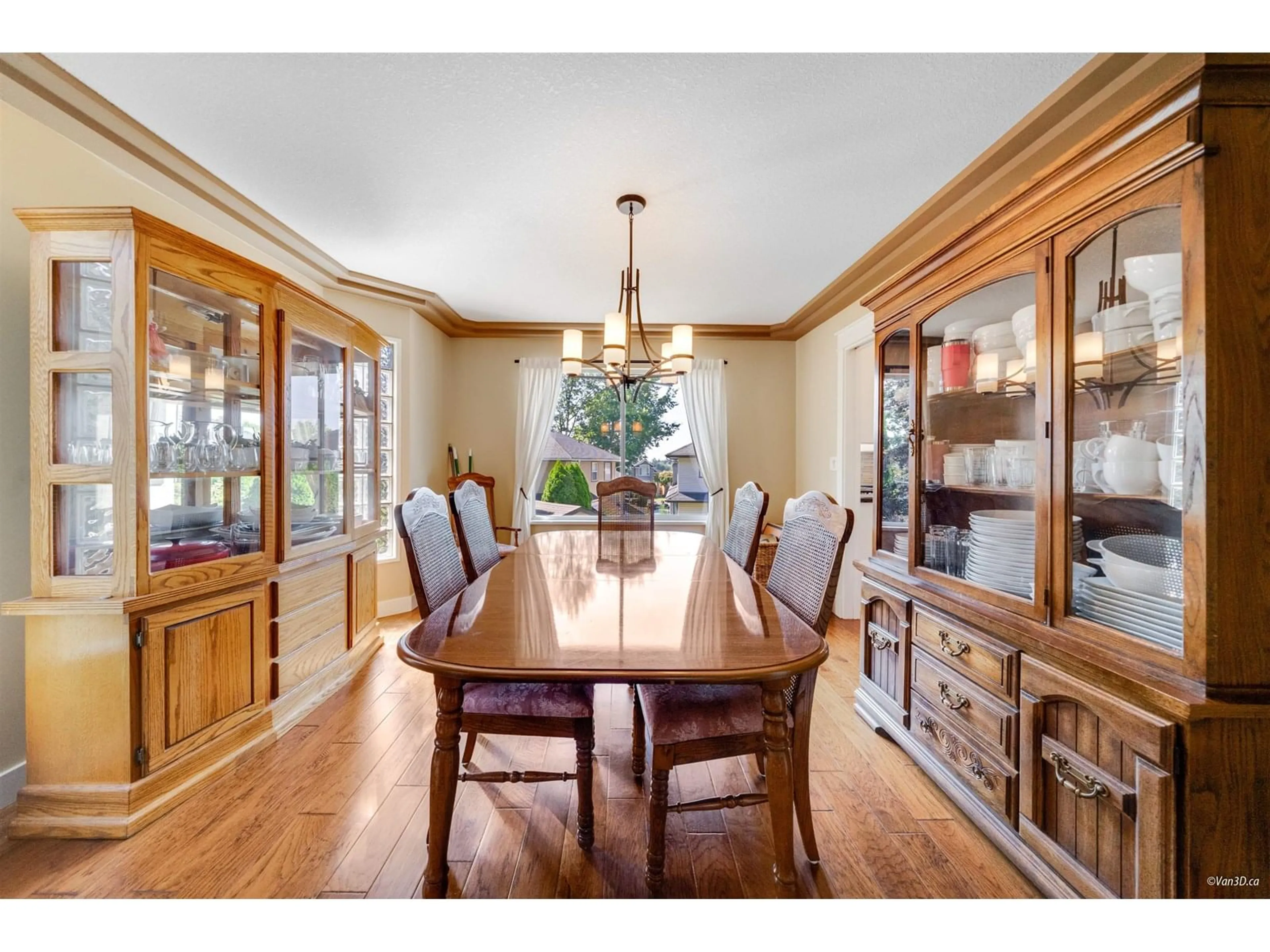 Dining room, wood/laminate floor for 21558 84B, Langley British Columbia V1M2M1