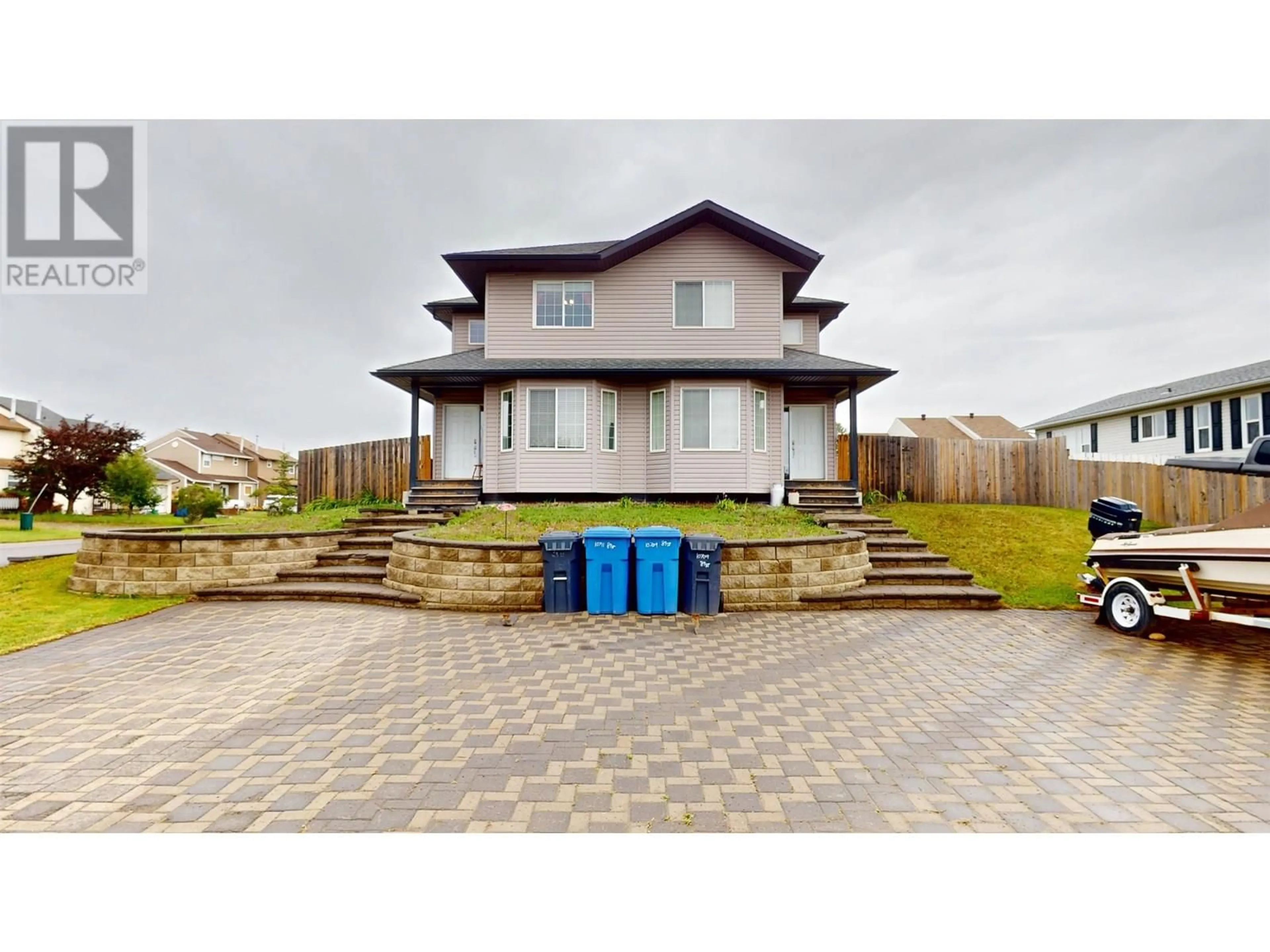 A pic from outside/outdoor area/front of a property/back of a property/a pic from drone, unknown for 10709 89 STREET, Fort St. John British Columbia V1J5S8