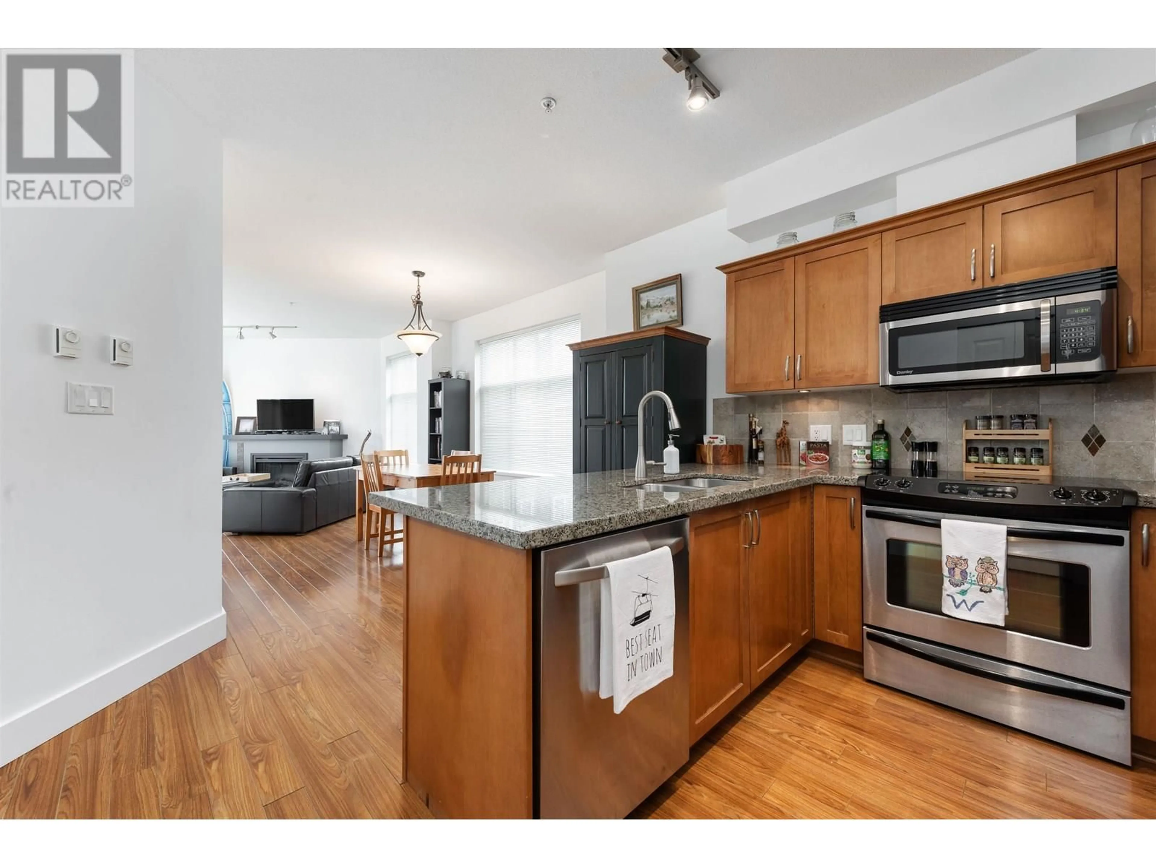 Open concept kitchen, wood/laminate floor for 301 - 1336 MAIN STREET, Squamish British Columbia V8B0R2