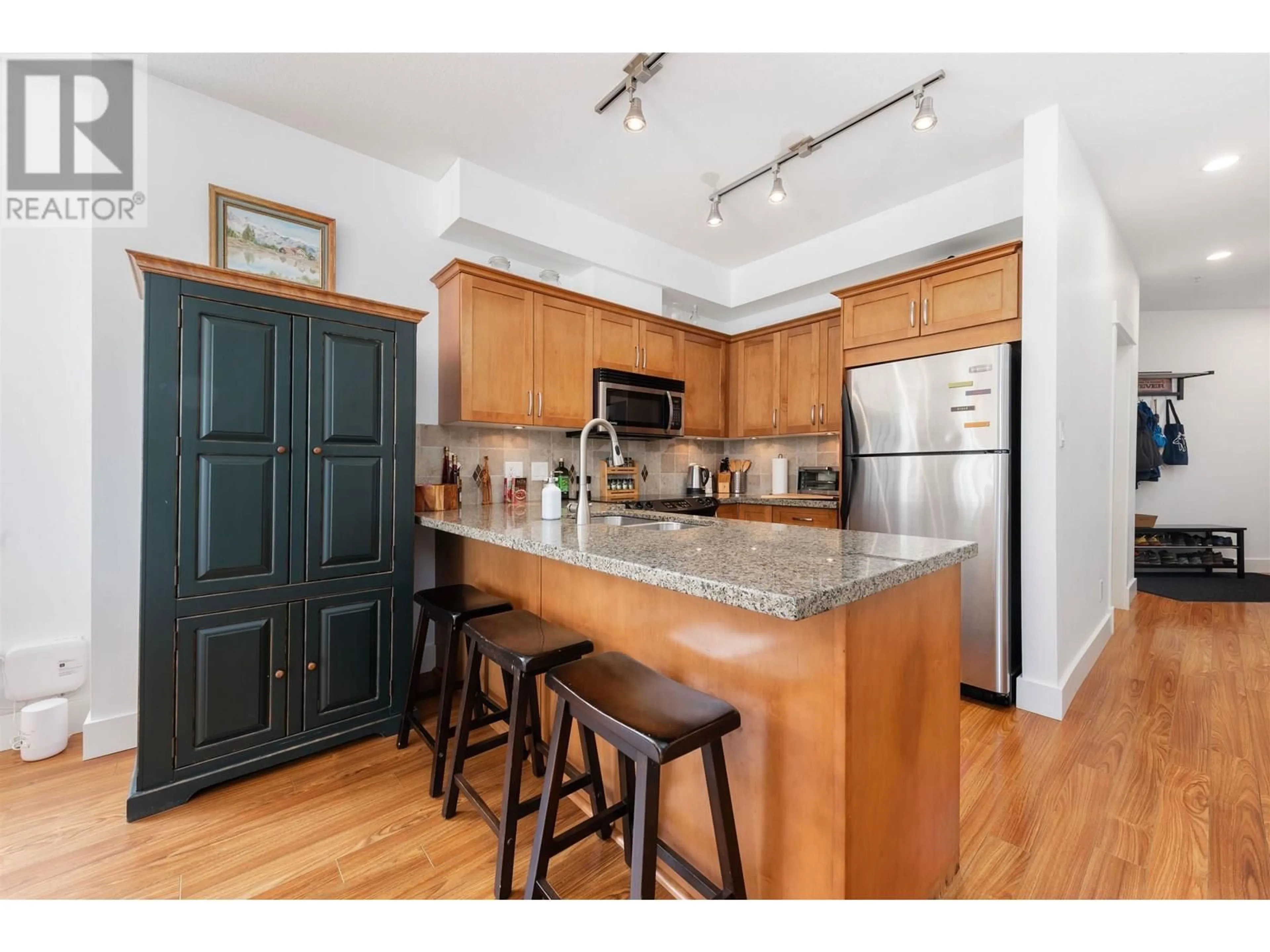 Open concept kitchen, wood/laminate floor for 301 - 1336 MAIN STREET, Squamish British Columbia V8B0R2