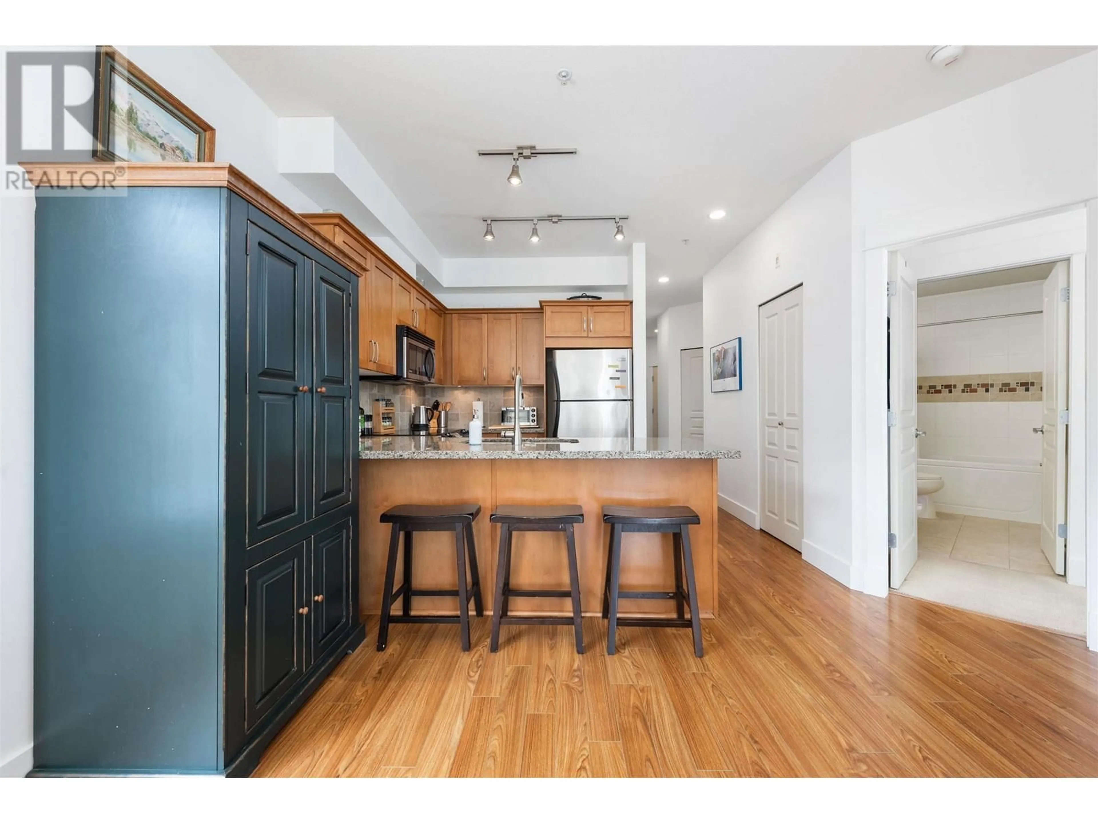 Open concept kitchen, wood/laminate floor for 301 - 1336 MAIN STREET, Squamish British Columbia V8B0R2