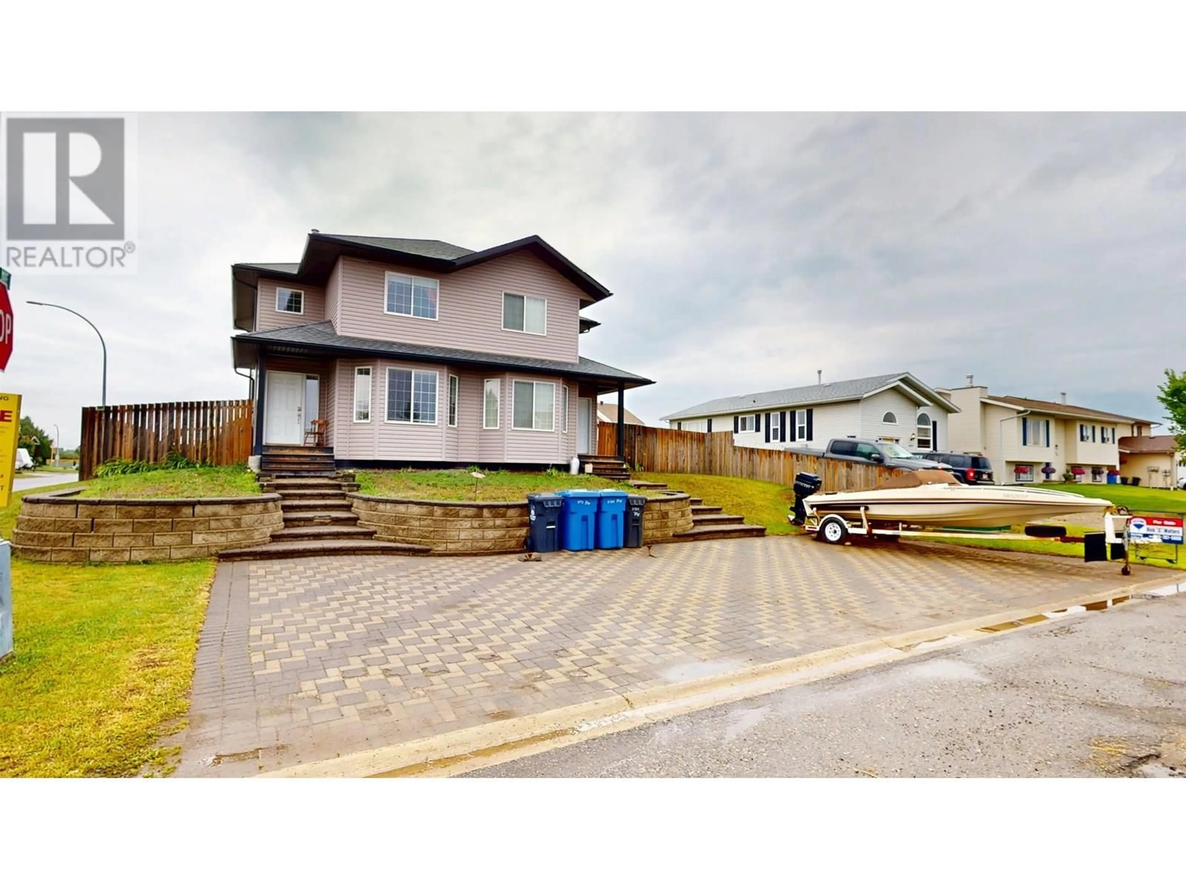 A pic from outside/outdoor area/front of a property/back of a property/a pic from drone, street for 10711 89 STREET, Fort St. John British Columbia V1J5S8
