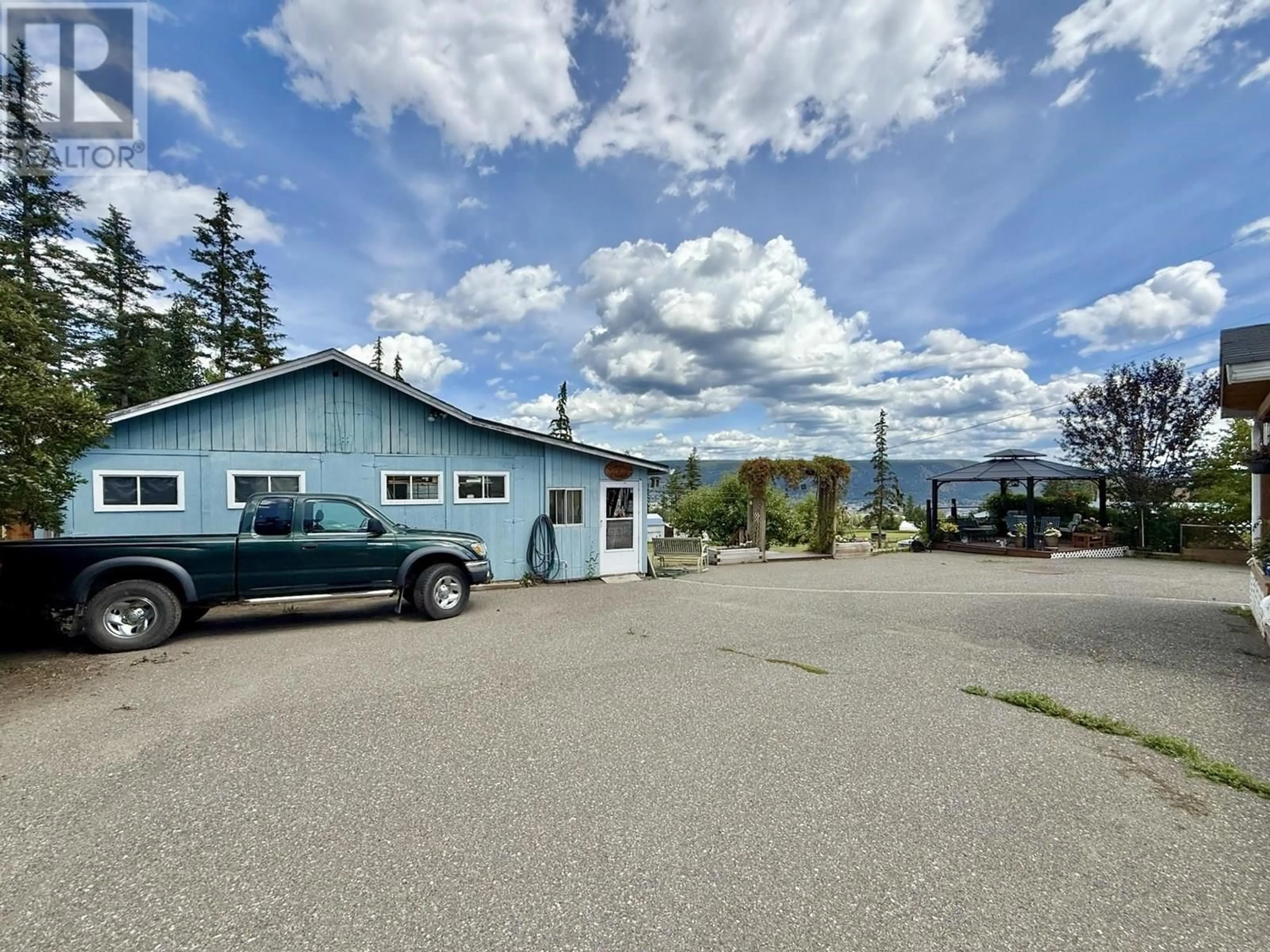 A pic from outside/outdoor area/front of a property/back of a property/a pic from drone, mountain view for 644 HODGSON ROAD, Williams Lake British Columbia V2G3P9