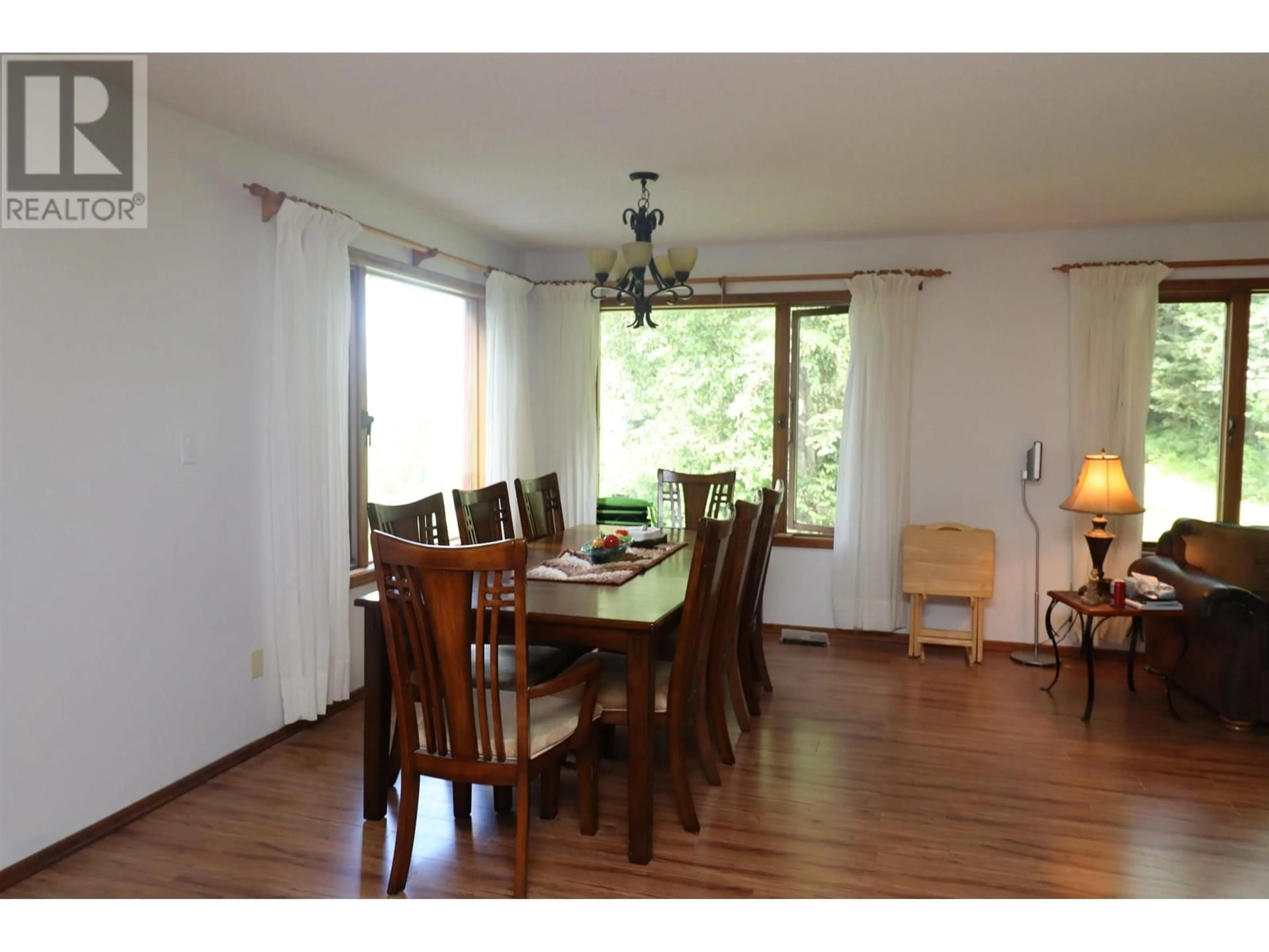 Dining room, wood/laminate floor for 9133 INGLEWOOD ROAD, Prince George British Columbia V2K5H6