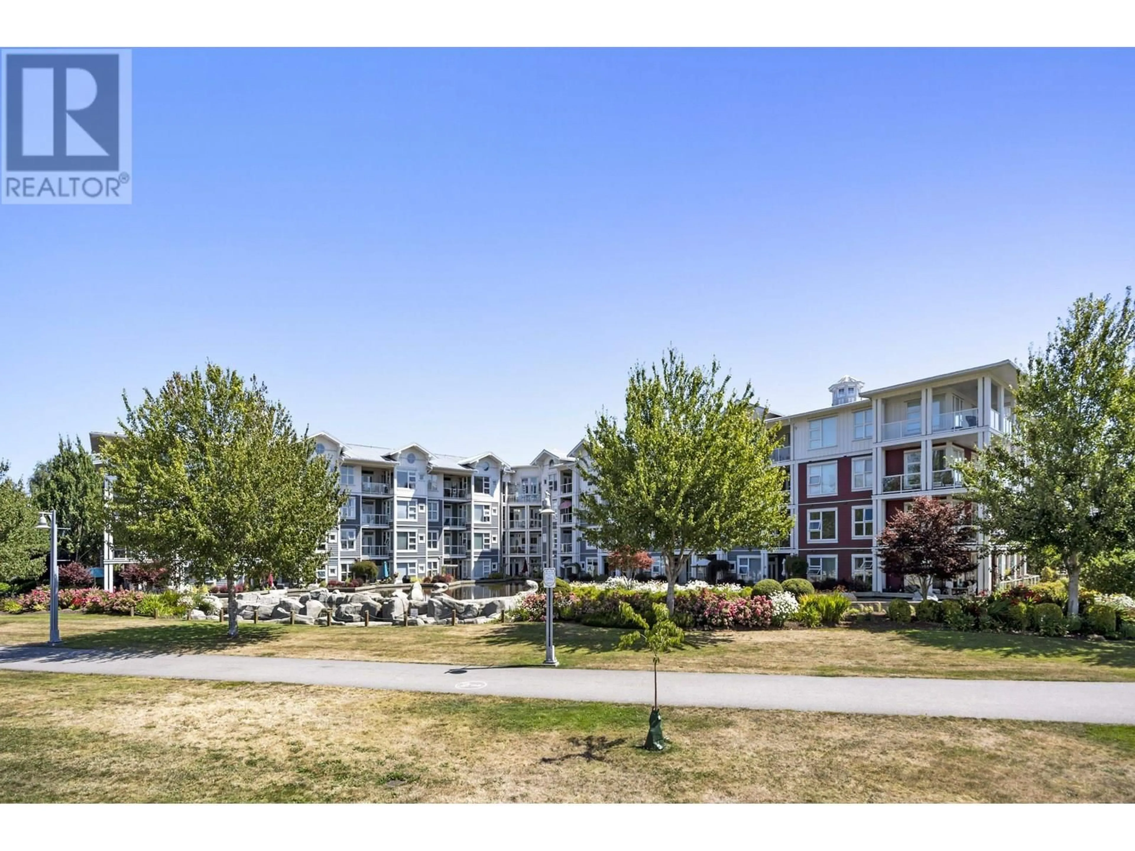 A pic from outside/outdoor area/front of a property/back of a property/a pic from drone, mountain view for 416 - 4500 WESTWATER DRIVE, Richmond British Columbia V7E6S1