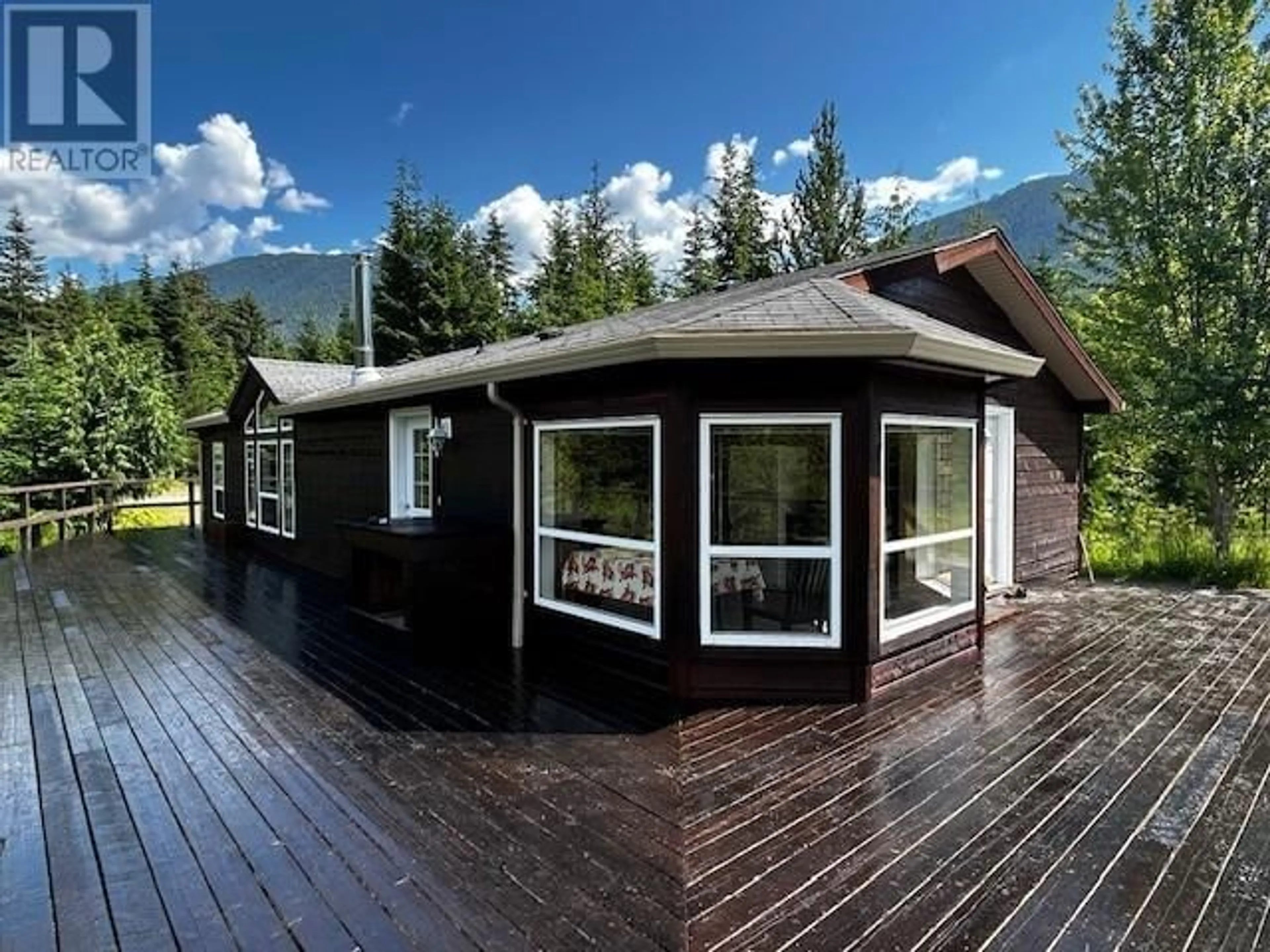 Home with vinyl exterior material, mountain view for 6191 CHIMDEMASH FRONTAGE ROAD, Terrace British Columbia V8G0A8