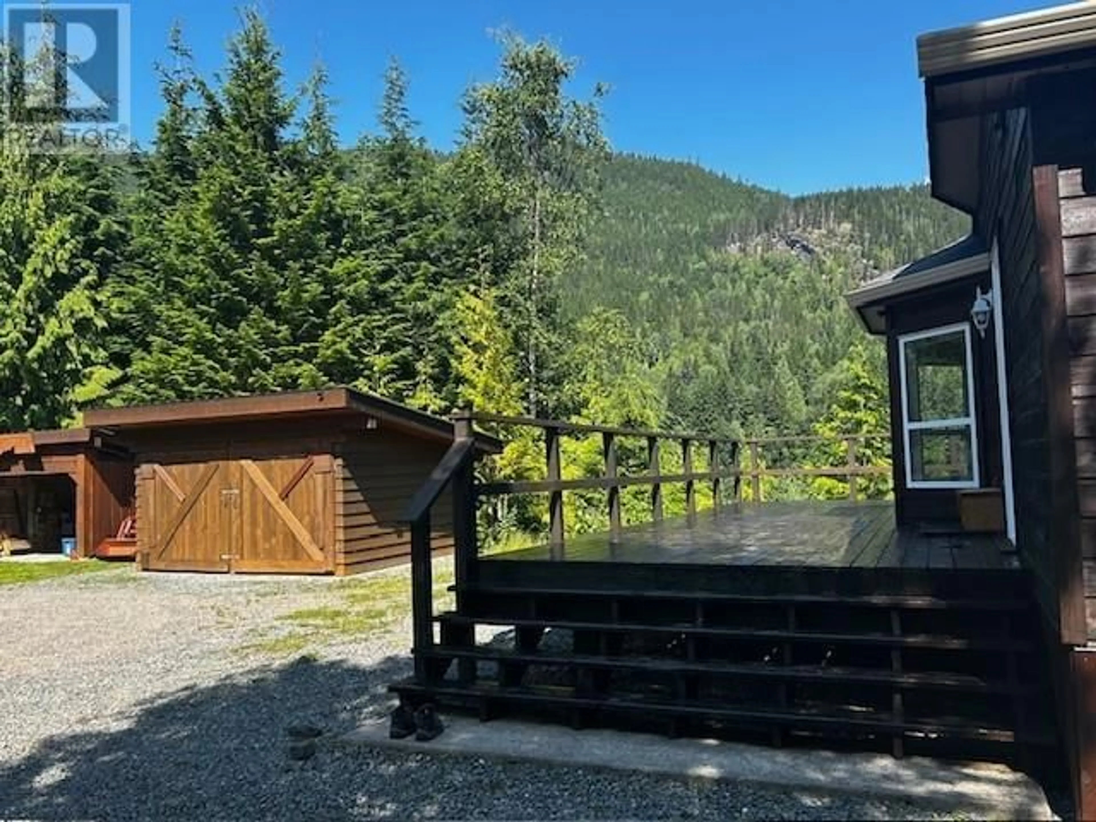 A pic from outside/outdoor area/front of a property/back of a property/a pic from drone, mountain view for 6191 CHIMDEMASH FRONTAGE ROAD, Terrace British Columbia V8G0A8