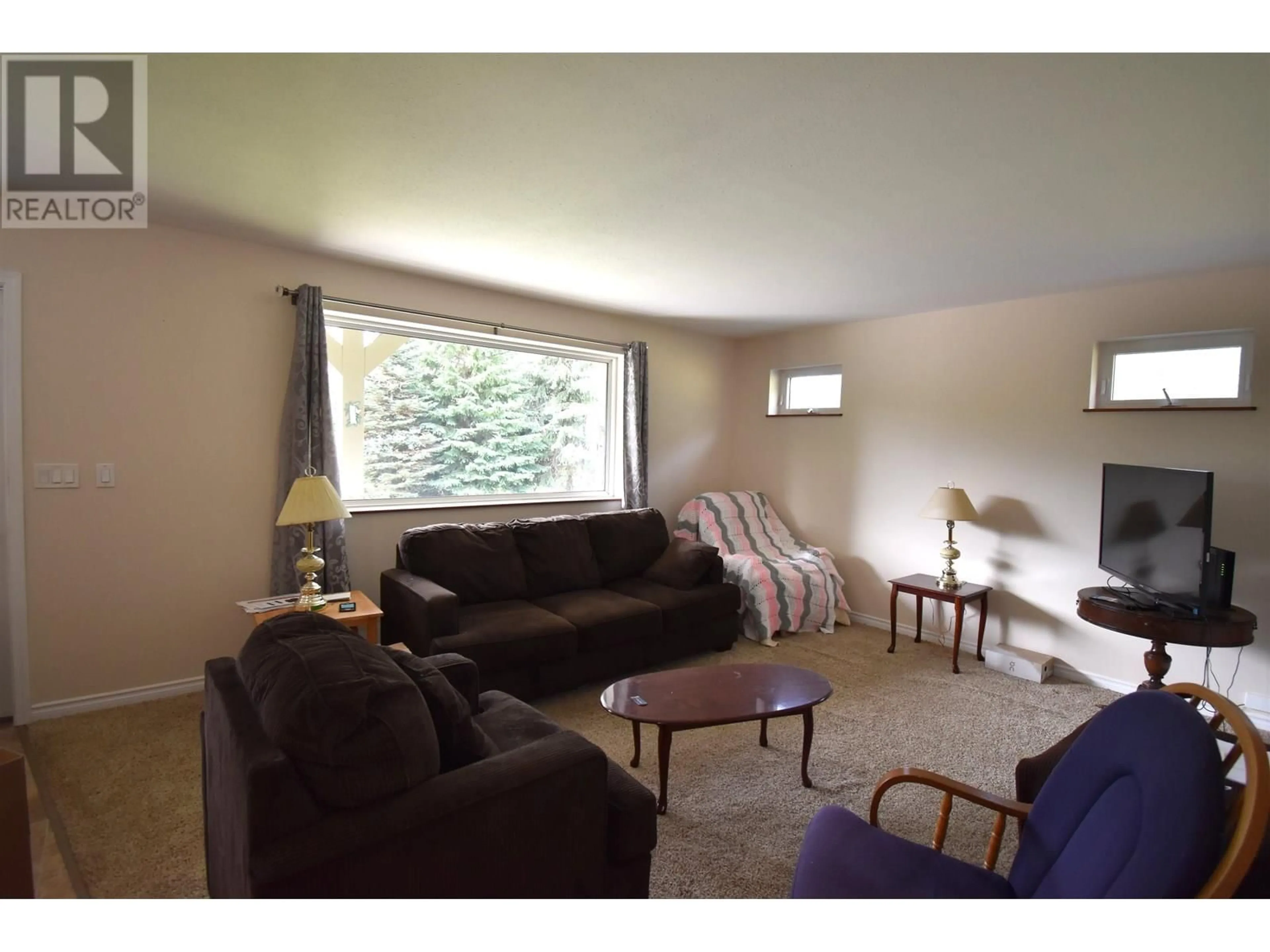Living room with furniture, unknown for 4815 STRATHERN ROAD, Hazelton British Columbia V0J1Y1