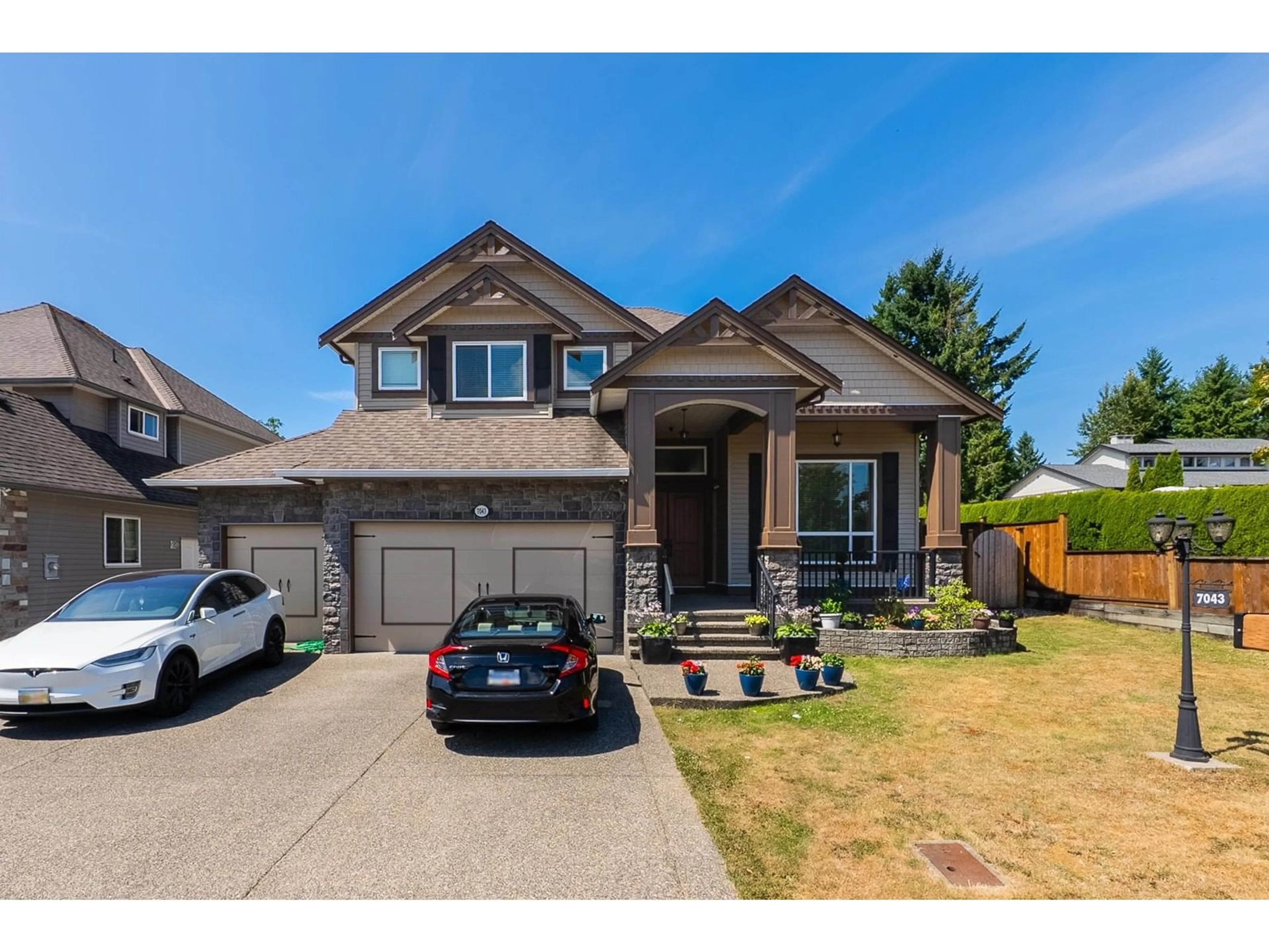 Home with vinyl exterior material, street for 7043 197B, Langley British Columbia V2Y0E9