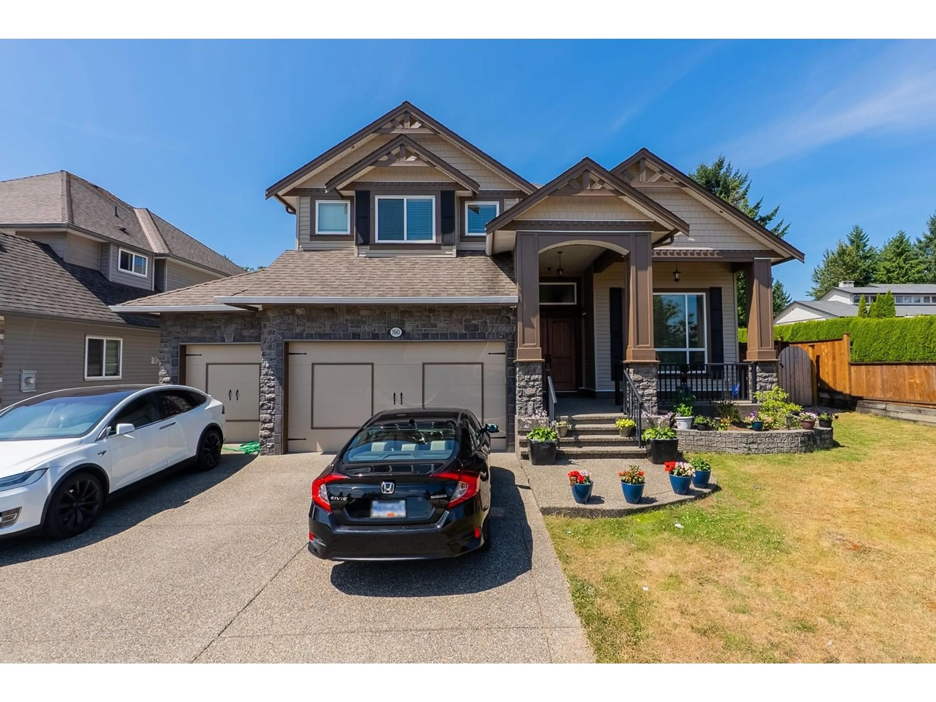Home with vinyl exterior material, street for 7043 197B, Langley British Columbia V2Y0E9