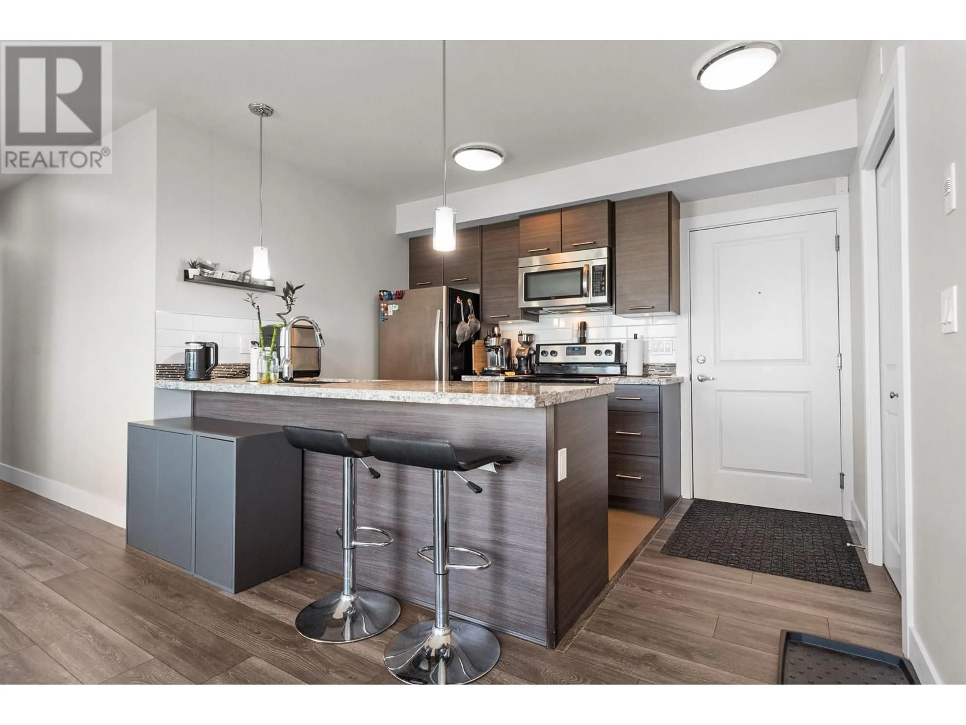 Open concept kitchen, wood/laminate floor for 301 - 7377 14TH AVENUE, Burnaby British Columbia V3N1Z7