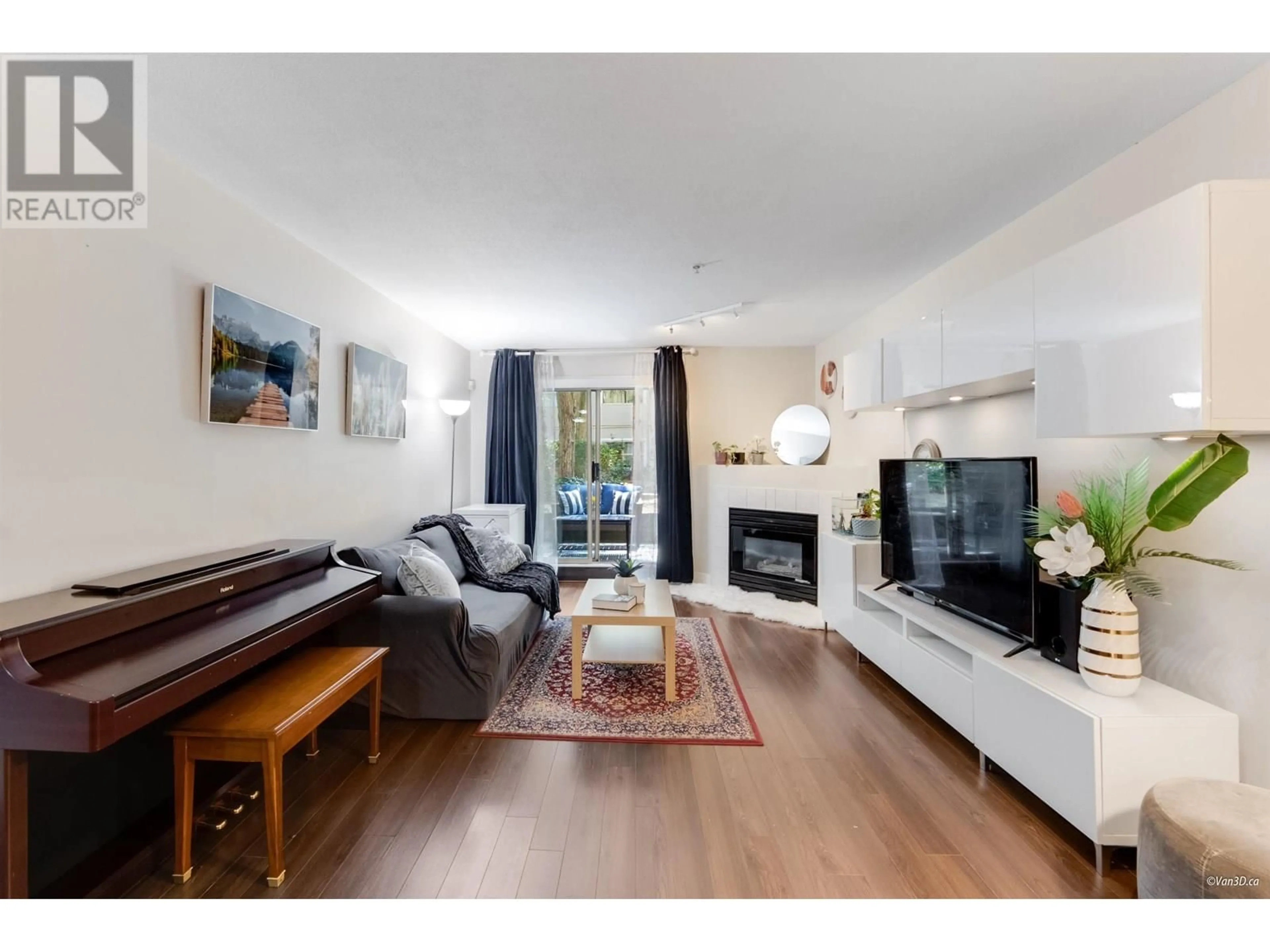 Living room with furniture, wood/laminate floor for 111 - 2615 JANE STREET, Port Coquitlam British Columbia V3C3K3