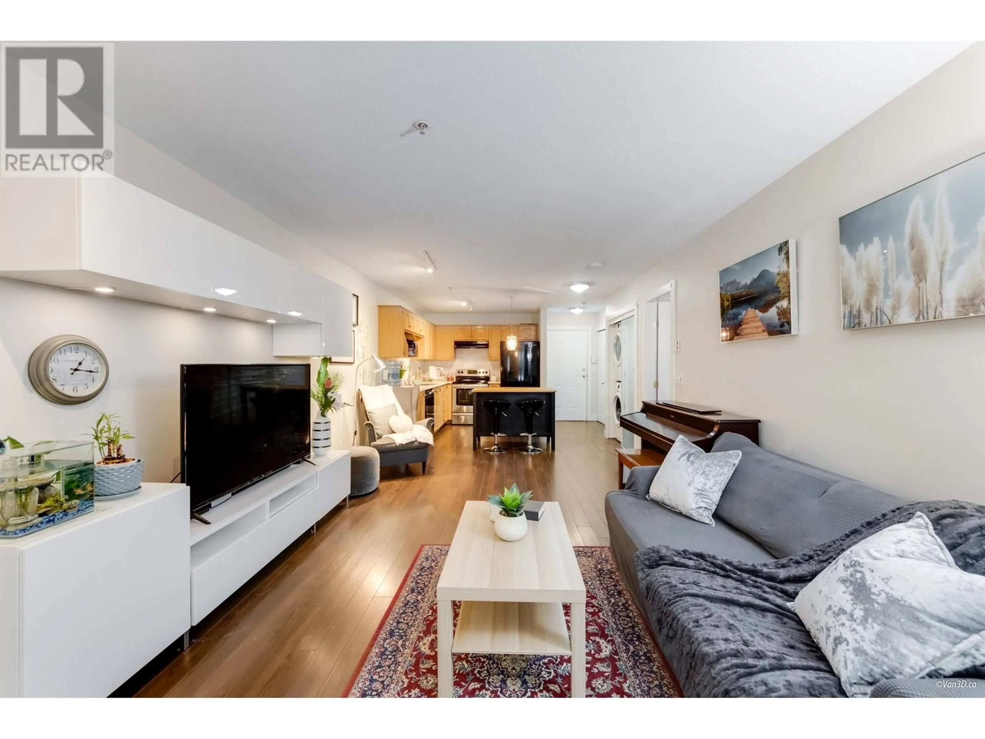 Living room with furniture, wood/laminate floor for 111 - 2615 JANE STREET, Port Coquitlam British Columbia V3C3K3