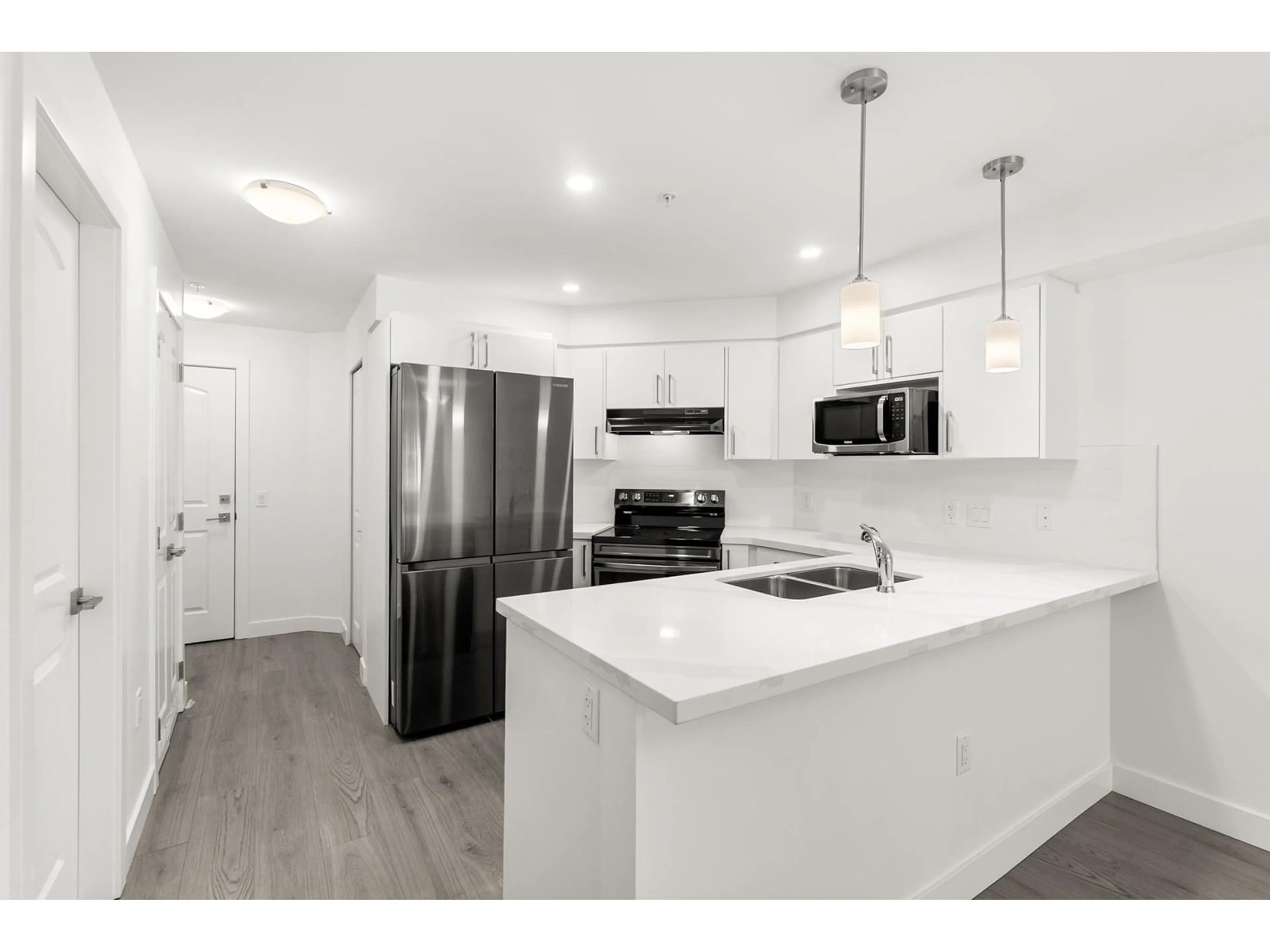 Open concept kitchen, unknown for 110 - 19730 56, Langley British Columbia V3A3X6