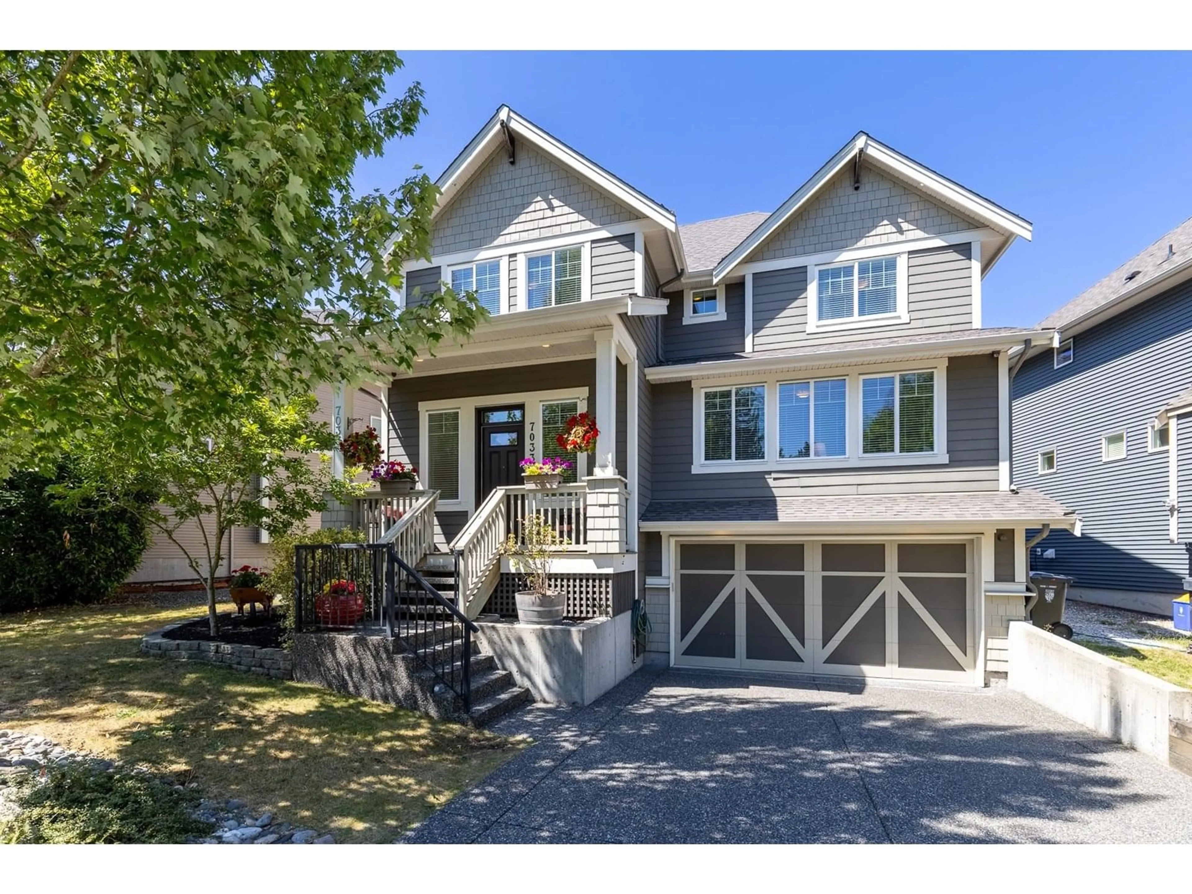 Home with vinyl exterior material, street for 7033 208A, Langley British Columbia V2Y0J2
