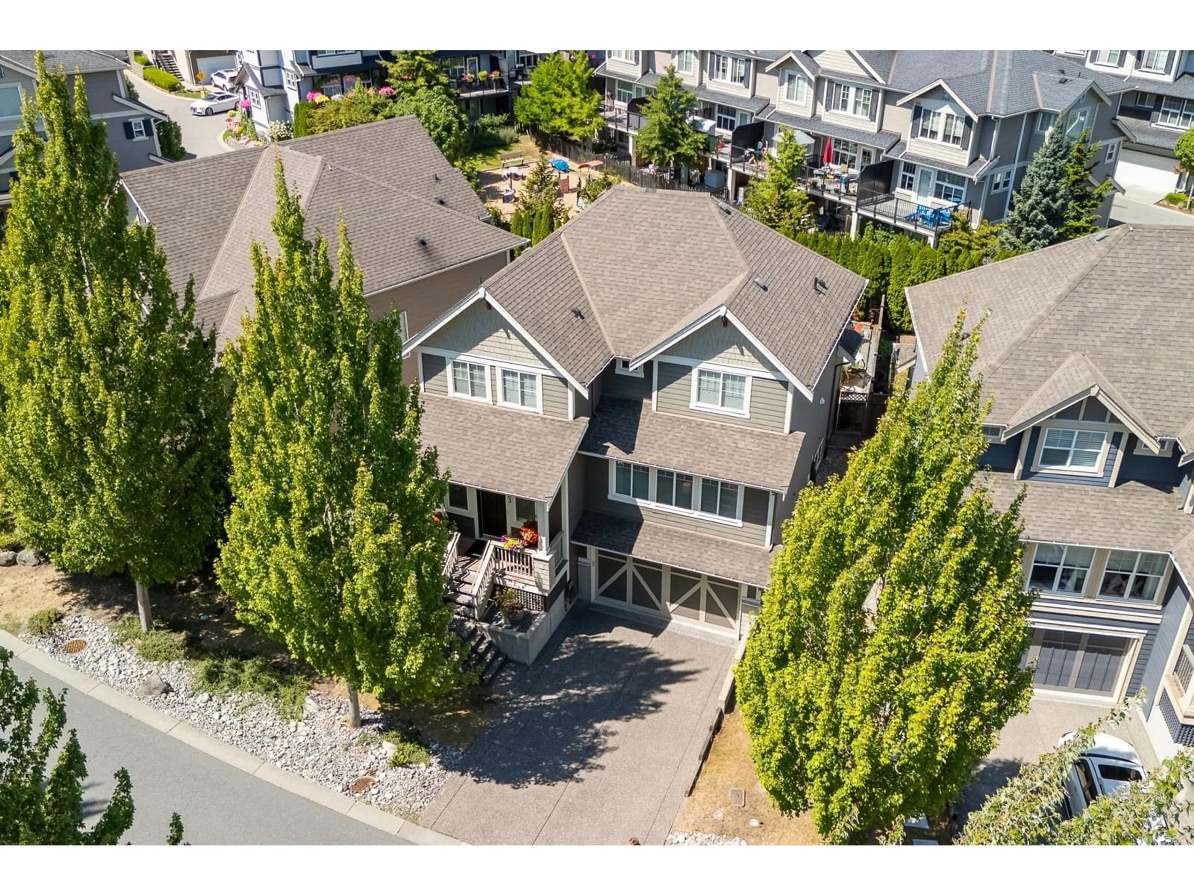 A pic from outside/outdoor area/front of a property/back of a property/a pic from drone, street for 7033 208A, Langley British Columbia V2Y0J2