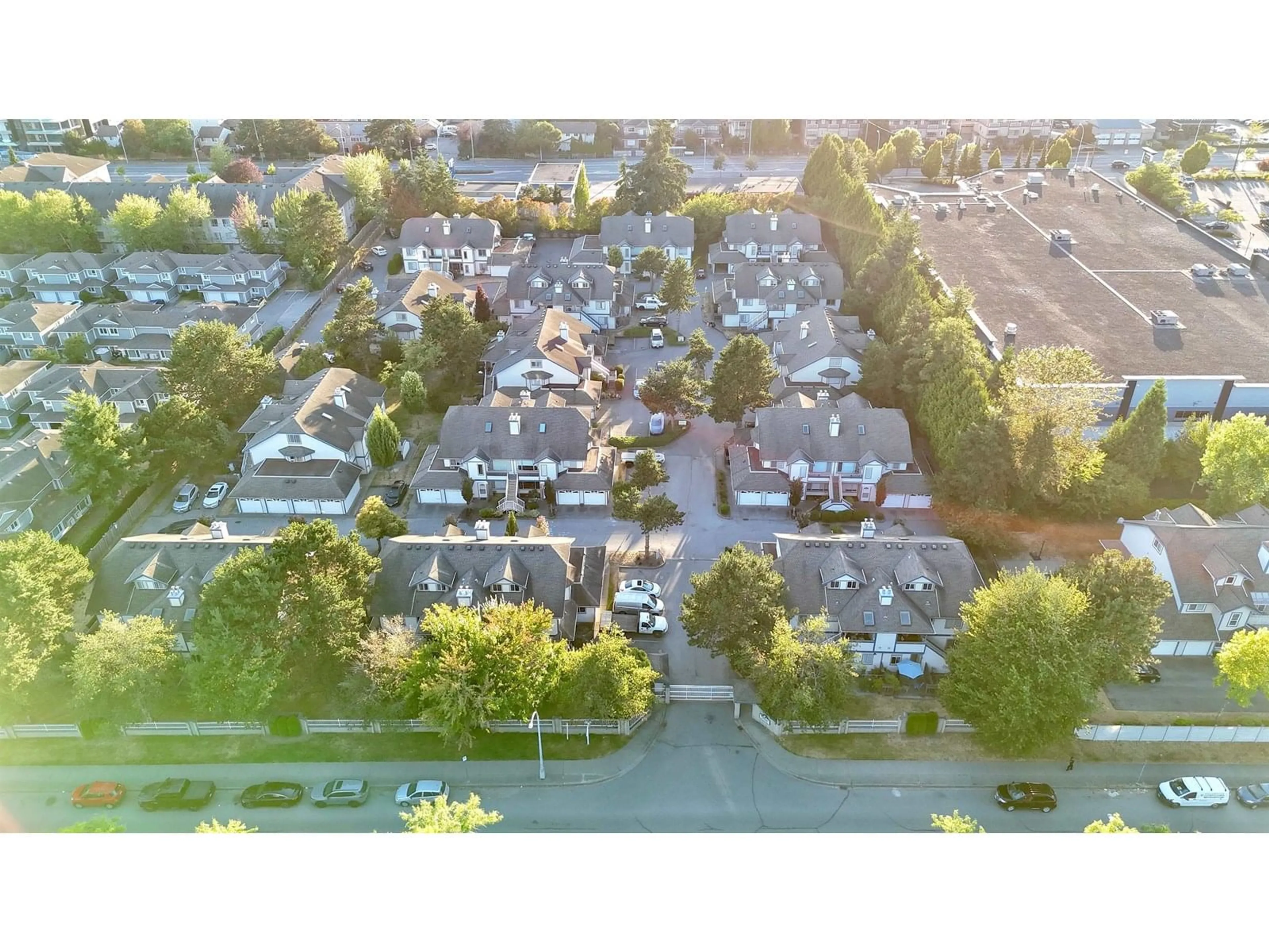 A pic from outside/outdoor area/front of a property/back of a property/a pic from drone, street for 113 - 7837 120A, Surrey British Columbia V3W0W9